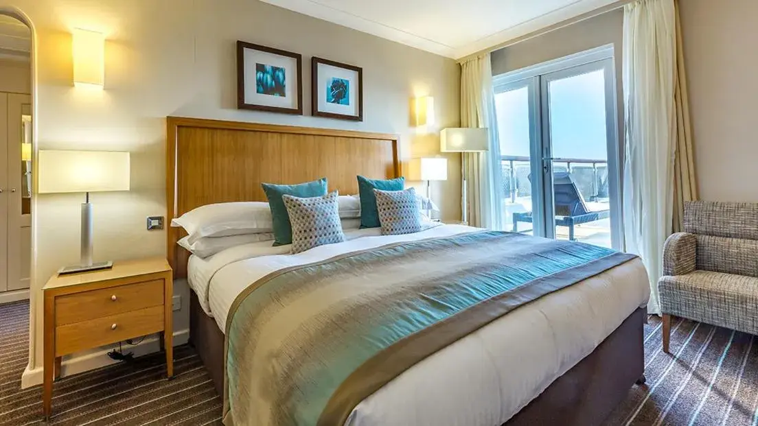 Bedroom, Bed in L’Horizon Beach Hotel & Spa Bedroom, Bed in L’Horizon Beach Hotel & Spa