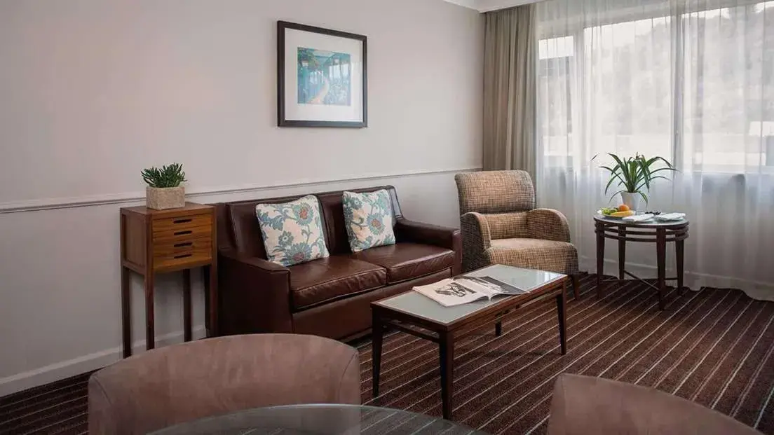 Living room in L’Horizon Beach Hotel & Spa Living room in L’Horizon Beach Hotel & Spa