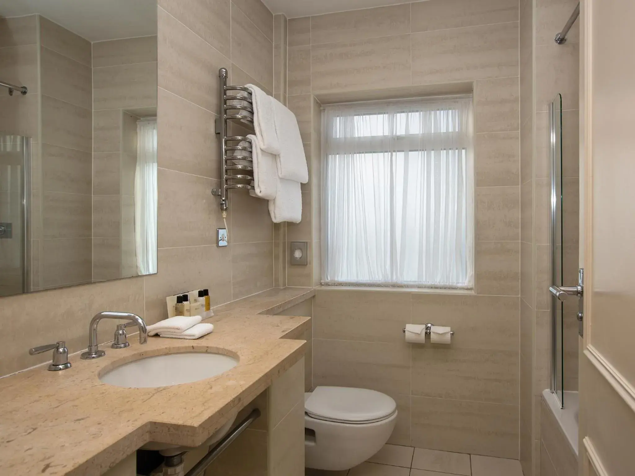 Bathroom in L’Horizon Beach Hotel & Spa Bathroom in L’Horizon Beach Hotel & Spa