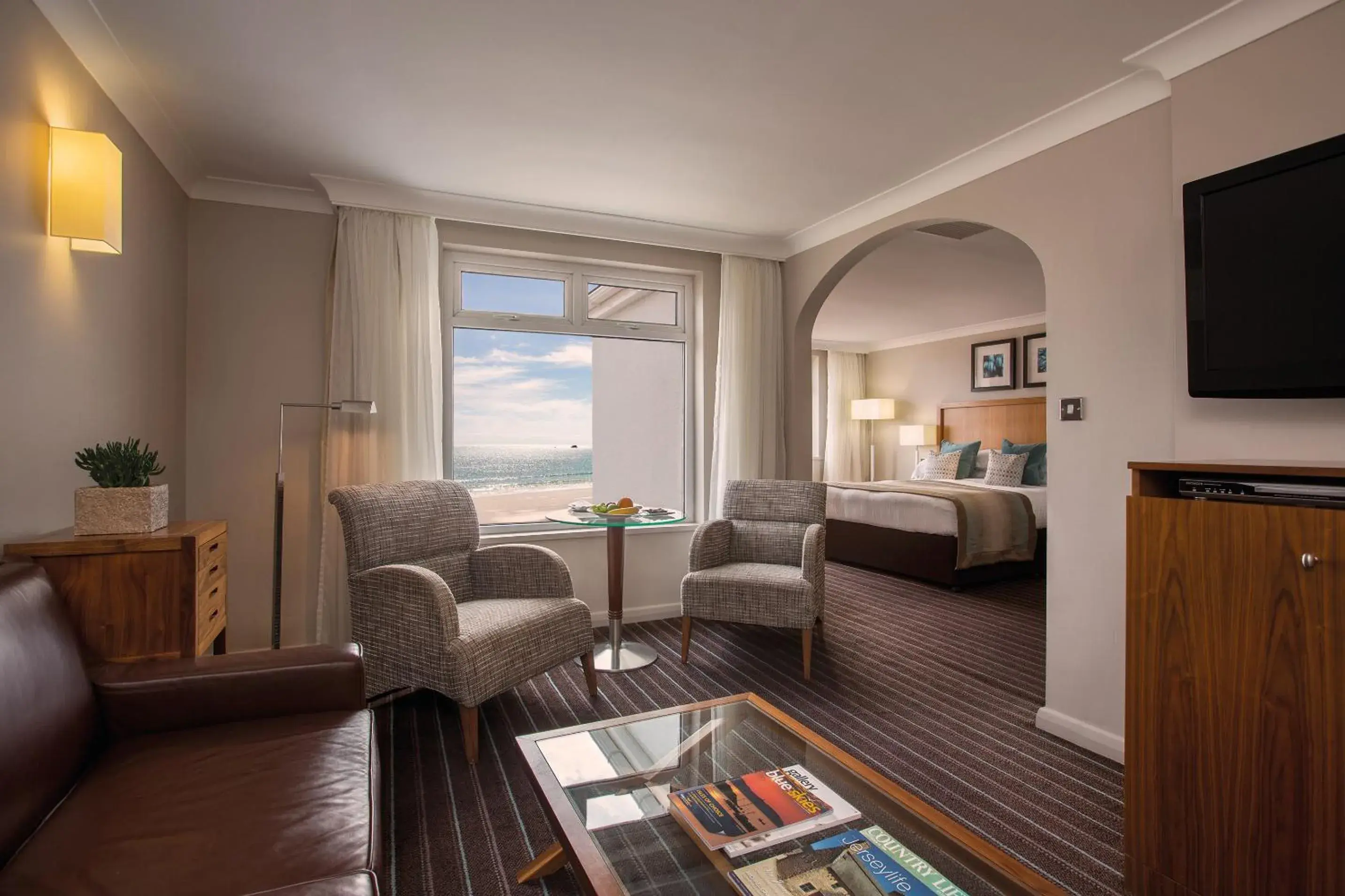 Living room, Bed in L’Horizon Beach Hotel & Spa Living room, Bed in L’Horizon Beach Hotel & Spa