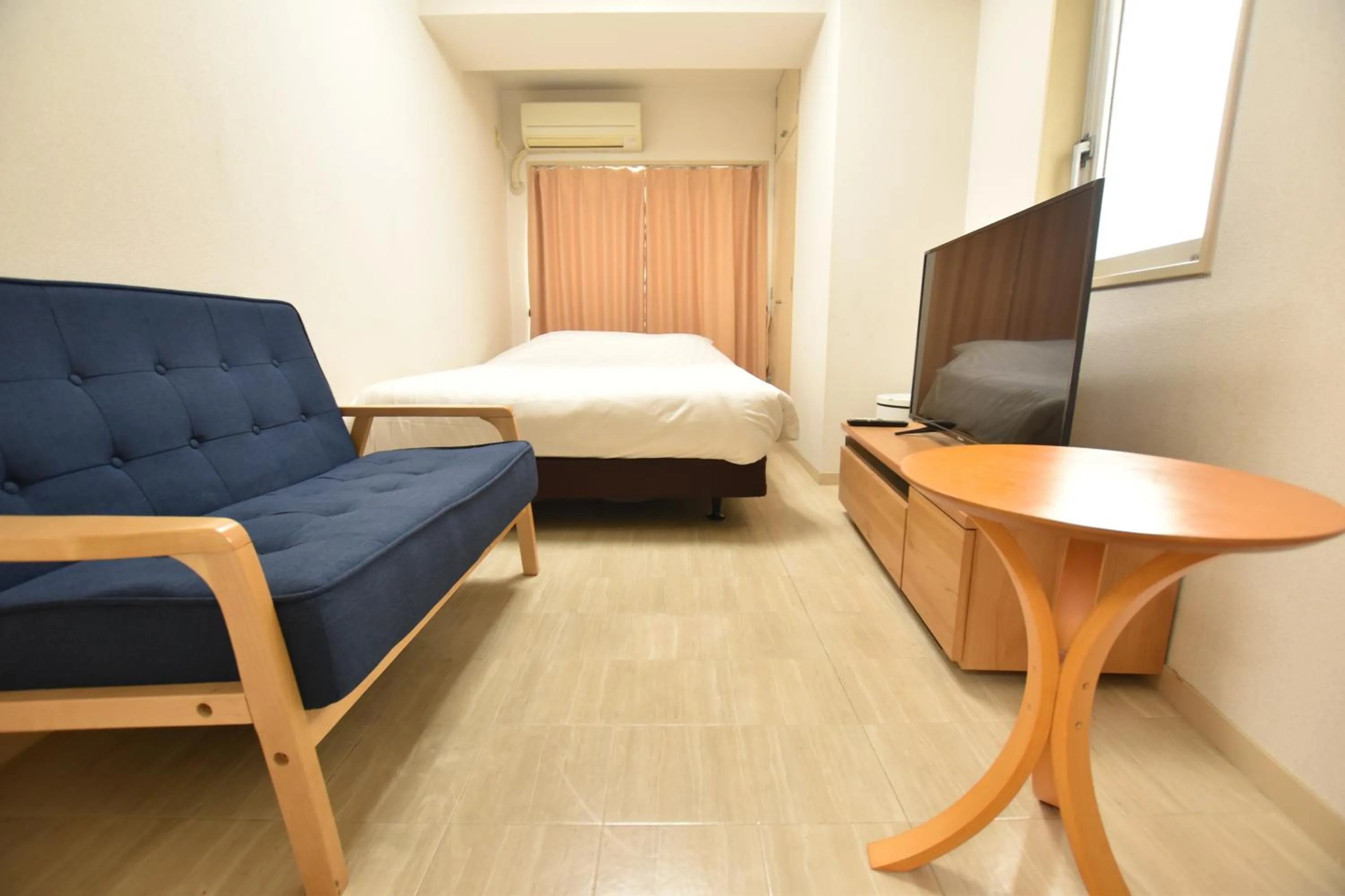 Bed in Randor Residence Tokyo Grand