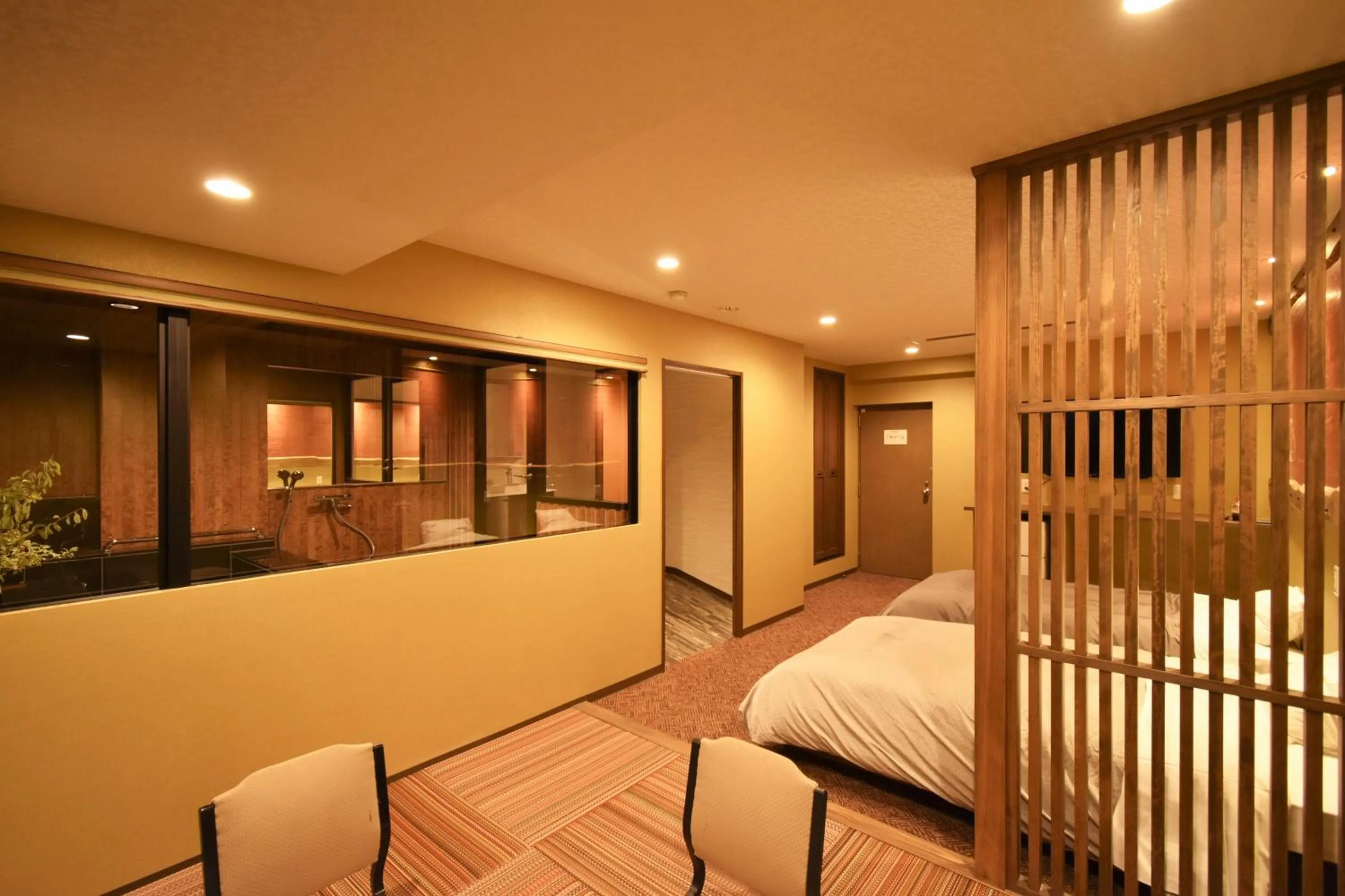 Bed in こんぴら温泉 貸切湯の宿 ことね