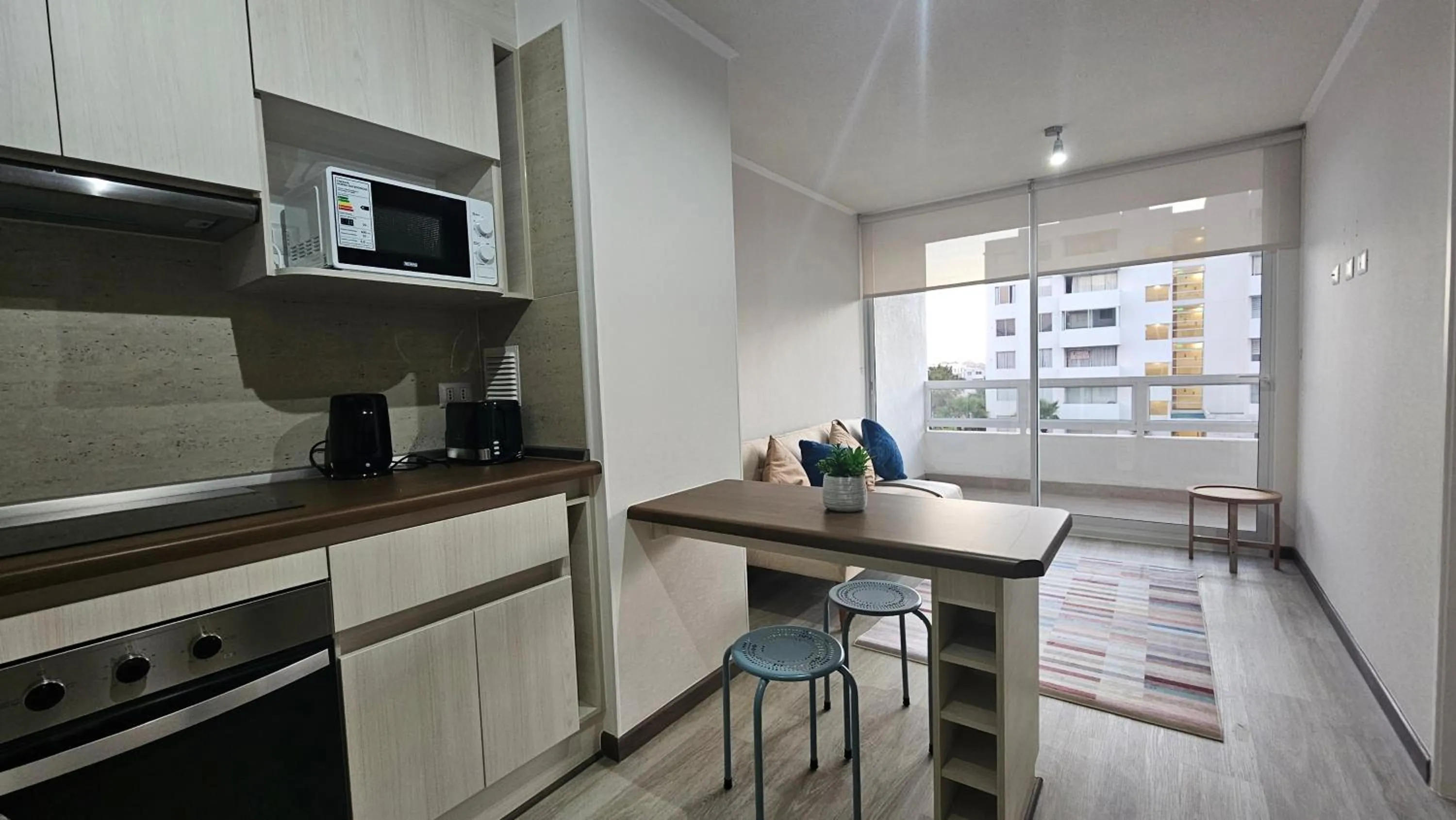 Kitchen or kitchenette in Oceana Suites Distrito Verde