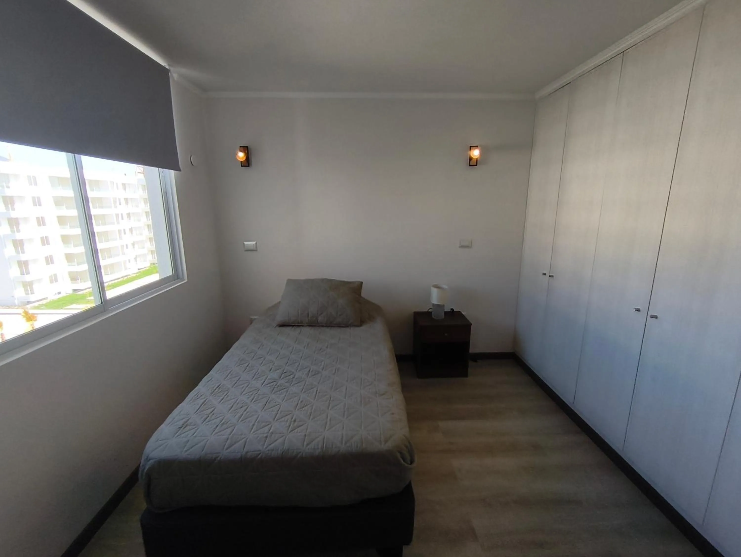 Bed in Oceana Suites Distrito Verde