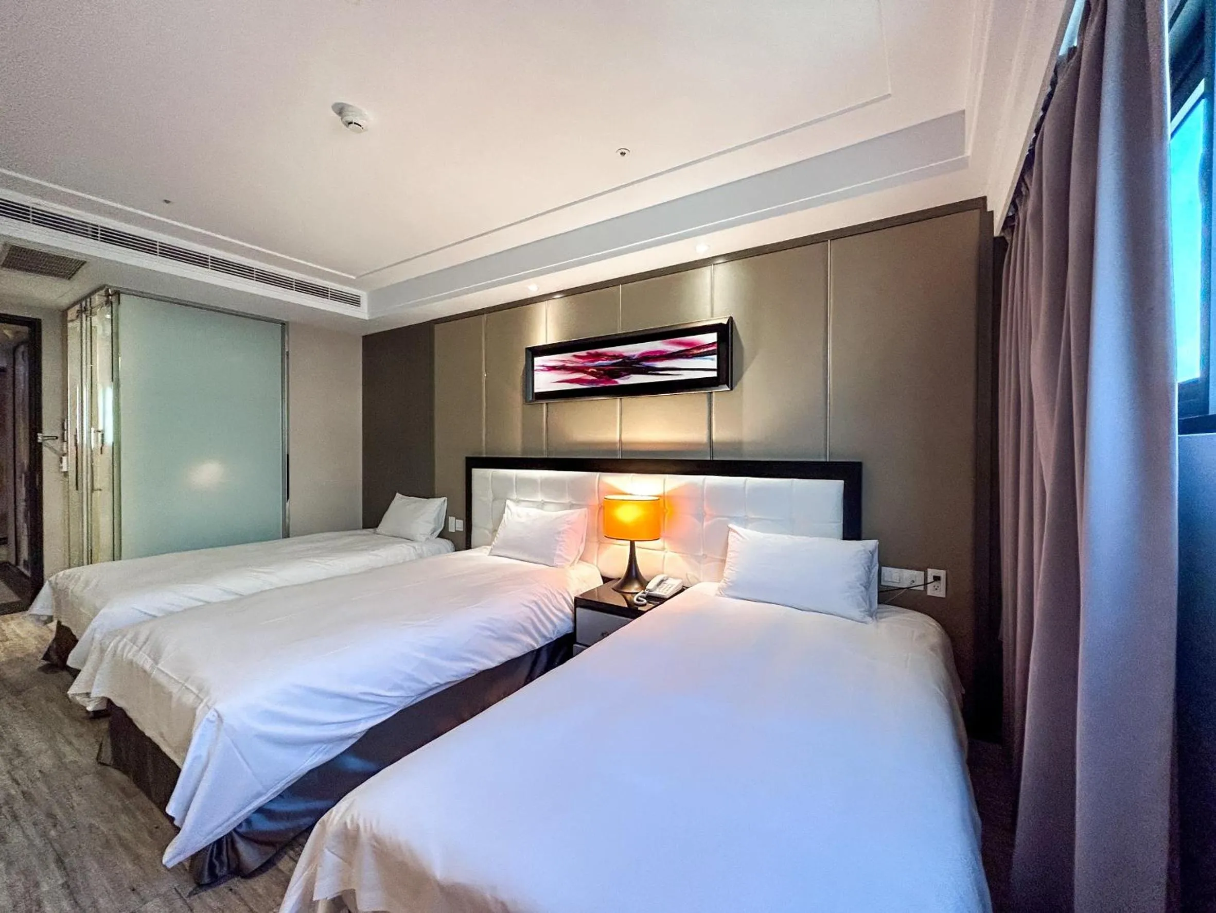 Bed in Royal Fine Hotel