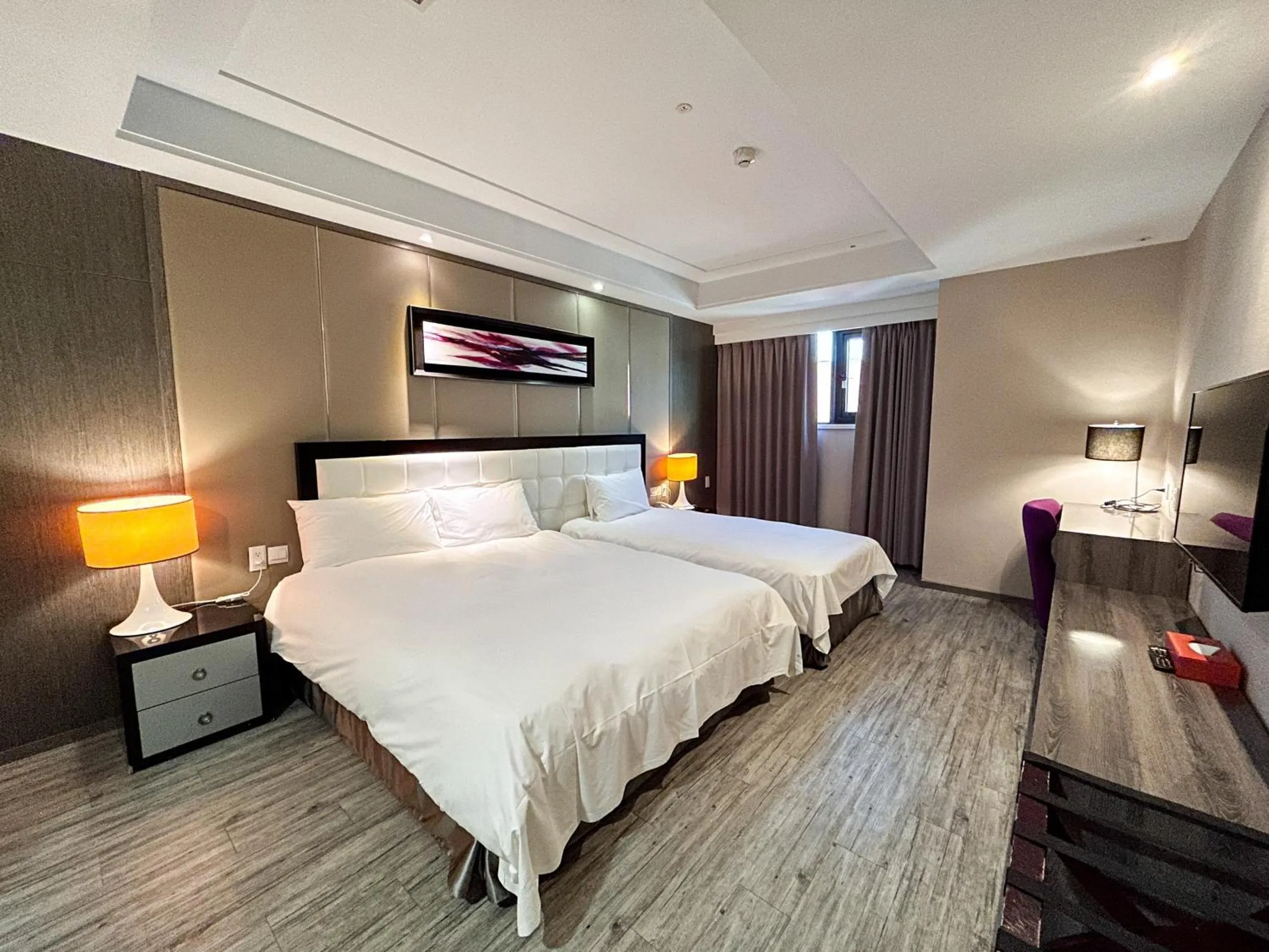 Bed in Royal Fine Hotel