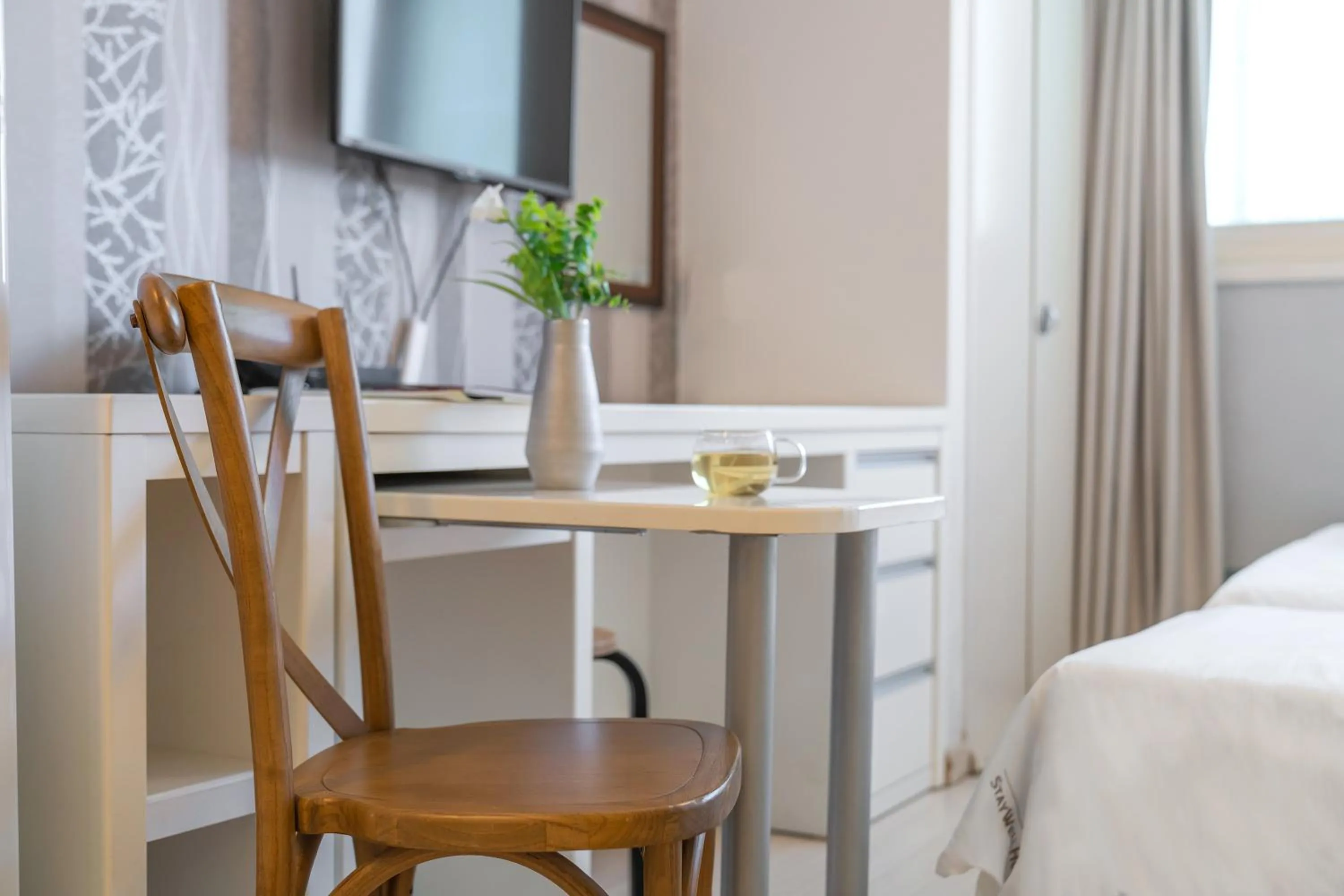 Bed in Staywell Hotel