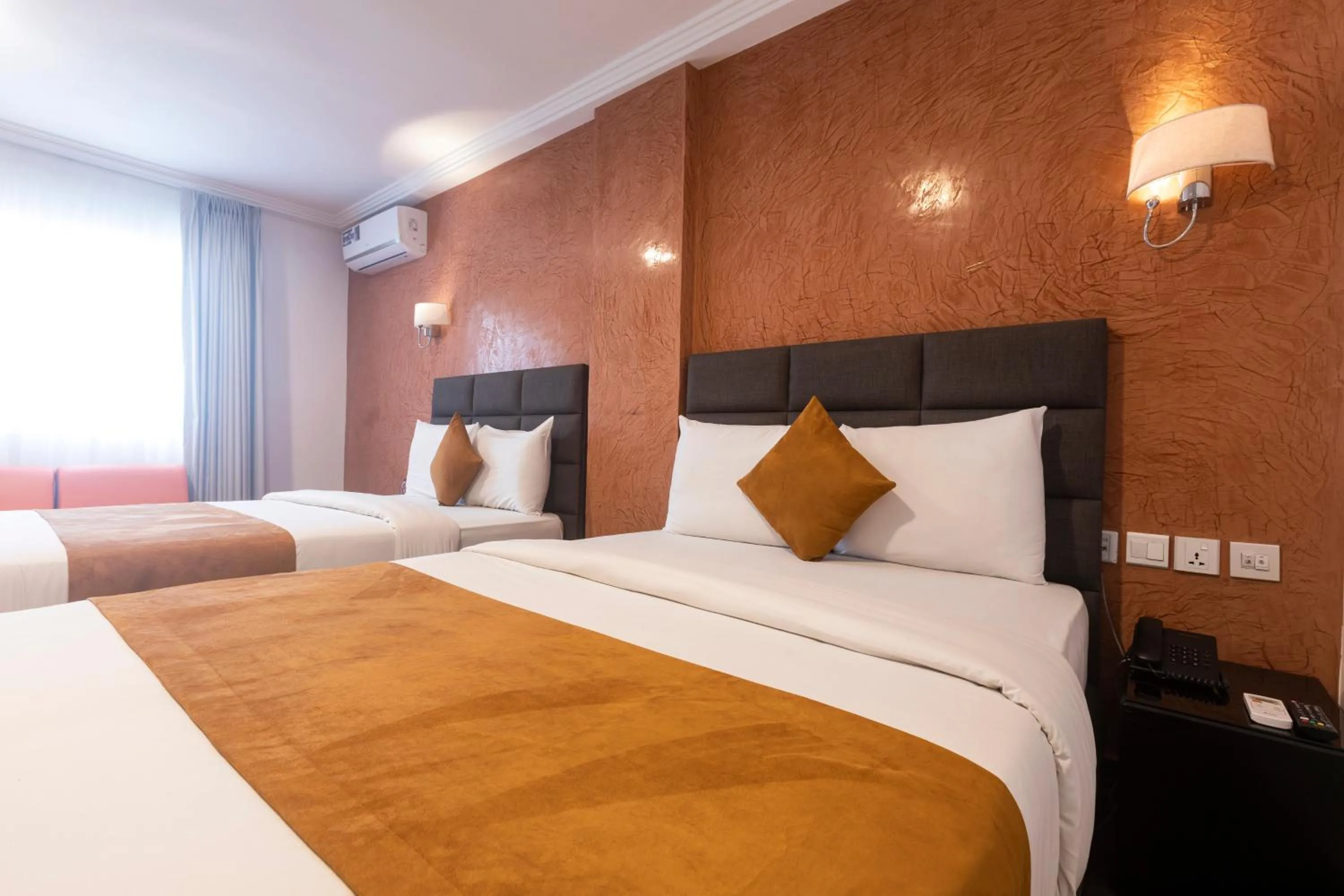 Bed in Airport View Hotel