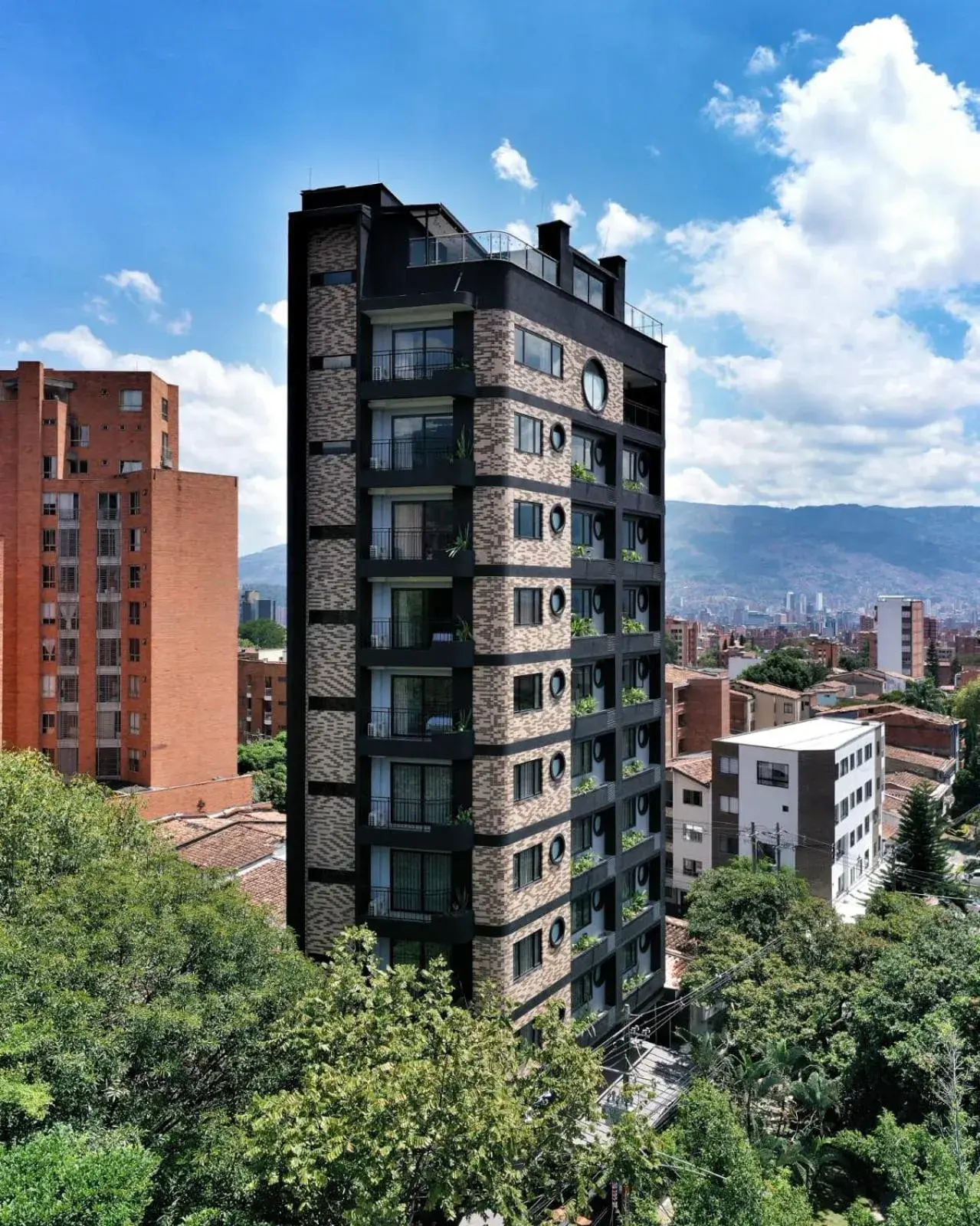 Property building in Hotel Living 35 Suites Property building in Hotel Living 35 Suites