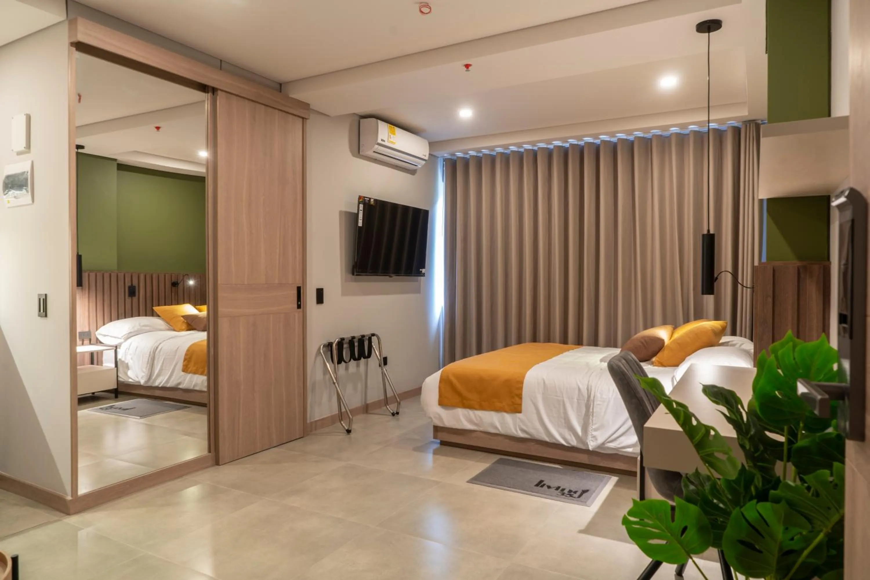 TV and multimedia, Bed in Hotel Living 35 Suites