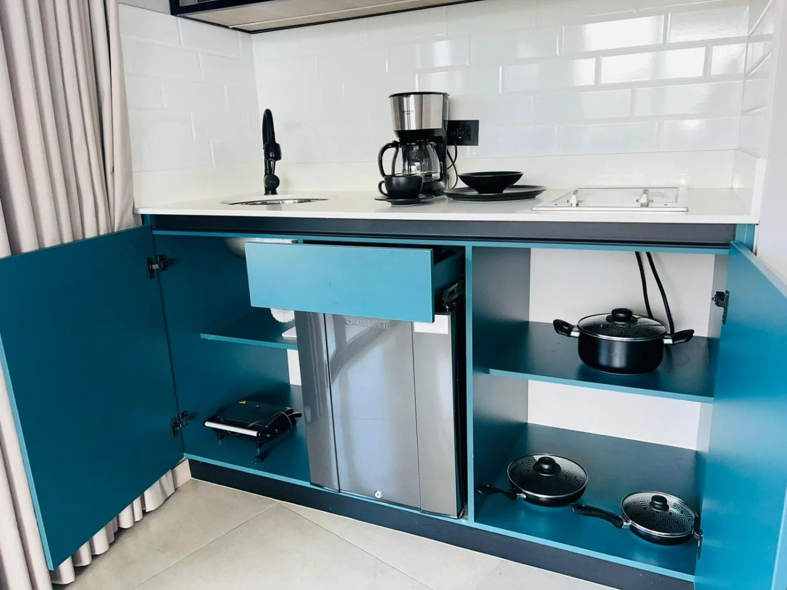 kitchen in Hotel Living 35 Suites