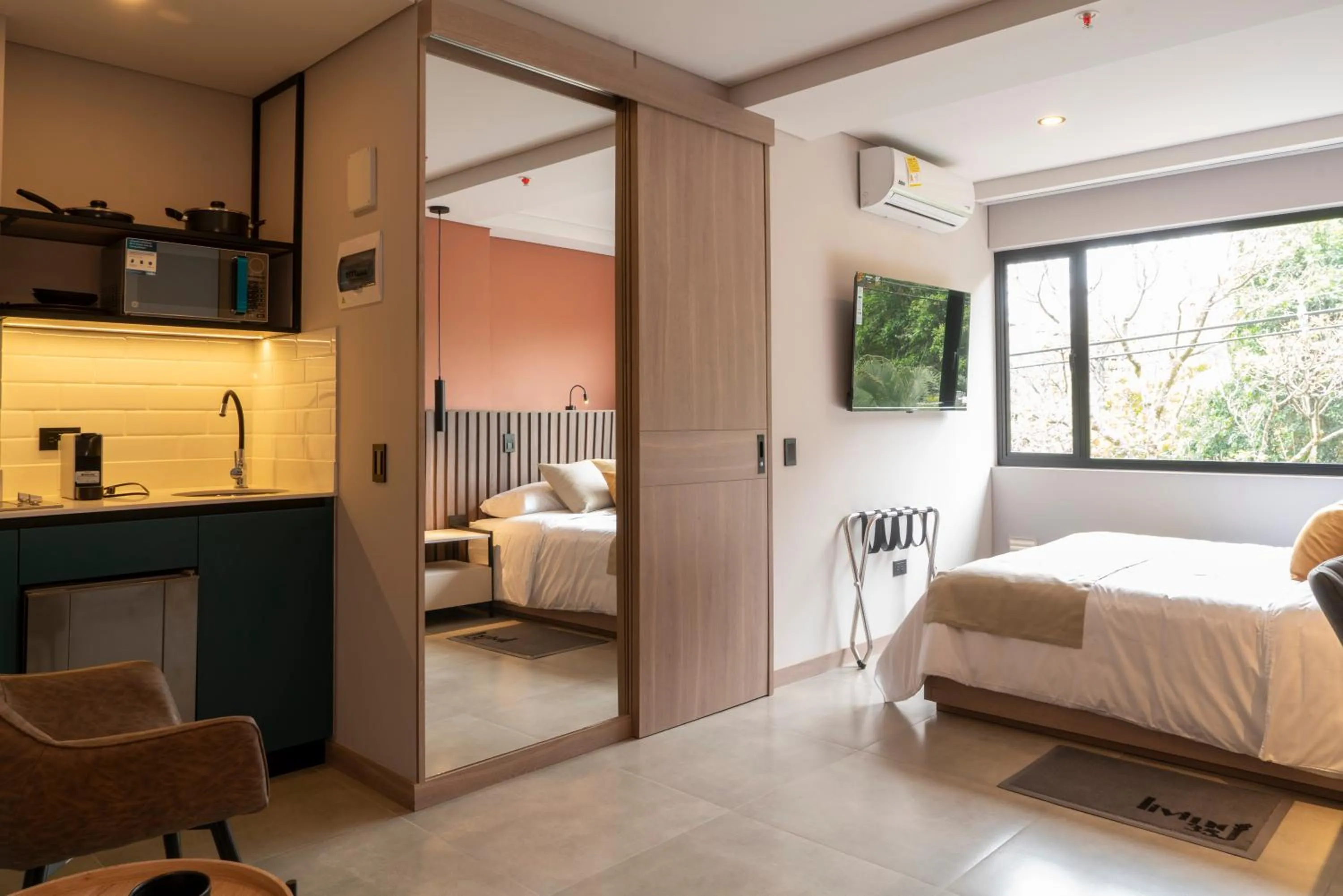 Photo of the whole room, Bed in Hotel Living 35 Suites