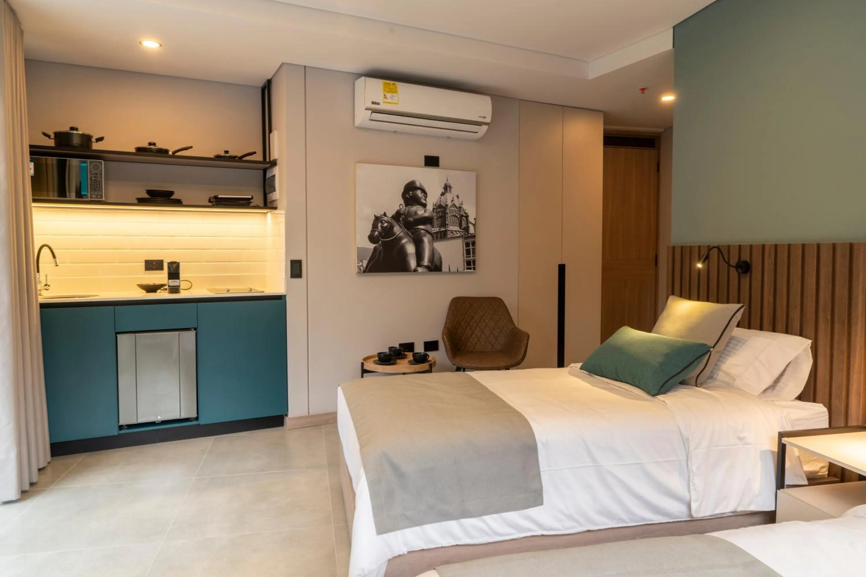 Bed in Hotel Living 35 Suites