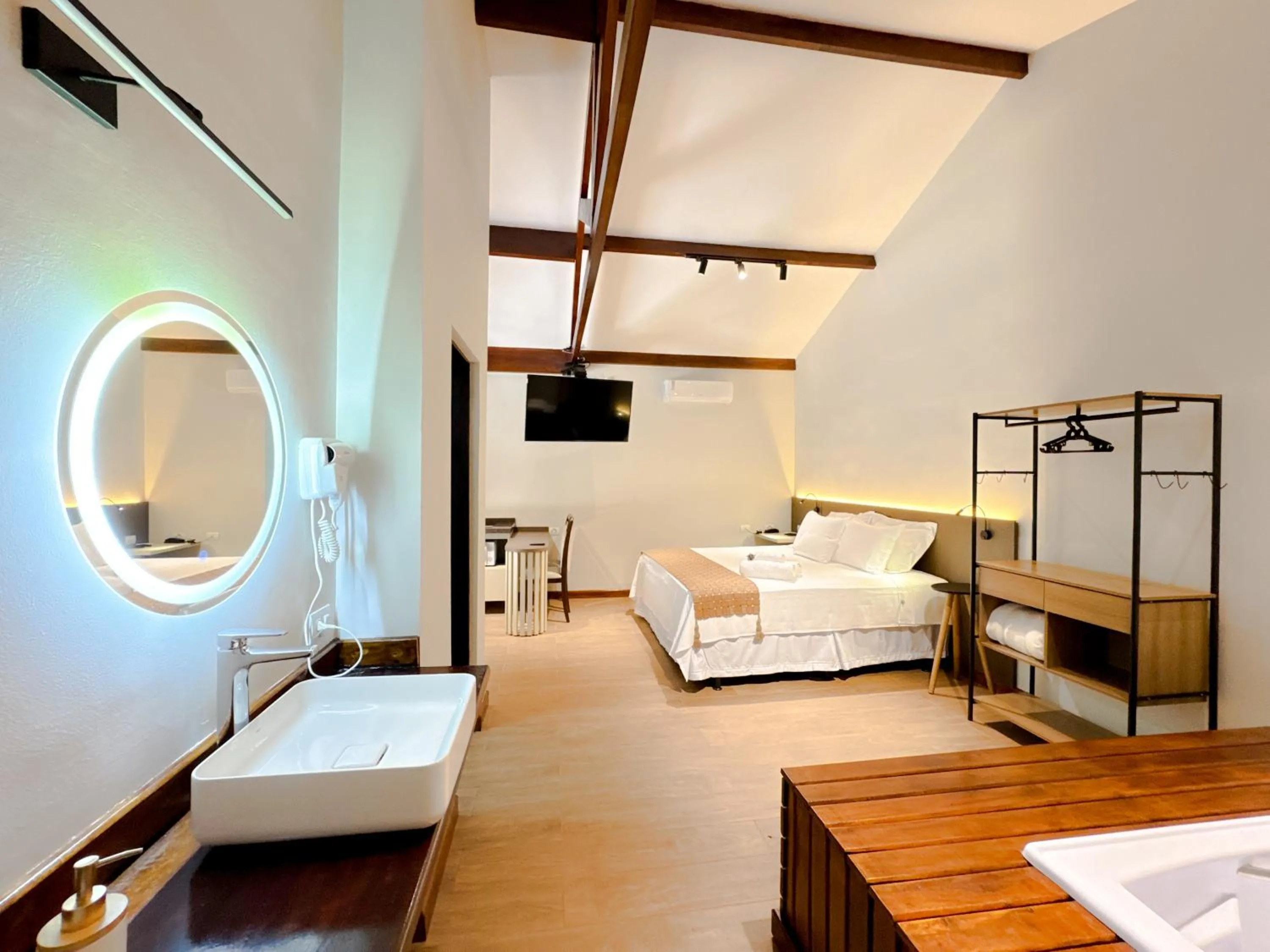 Bed in Pousada Flor de Ipe