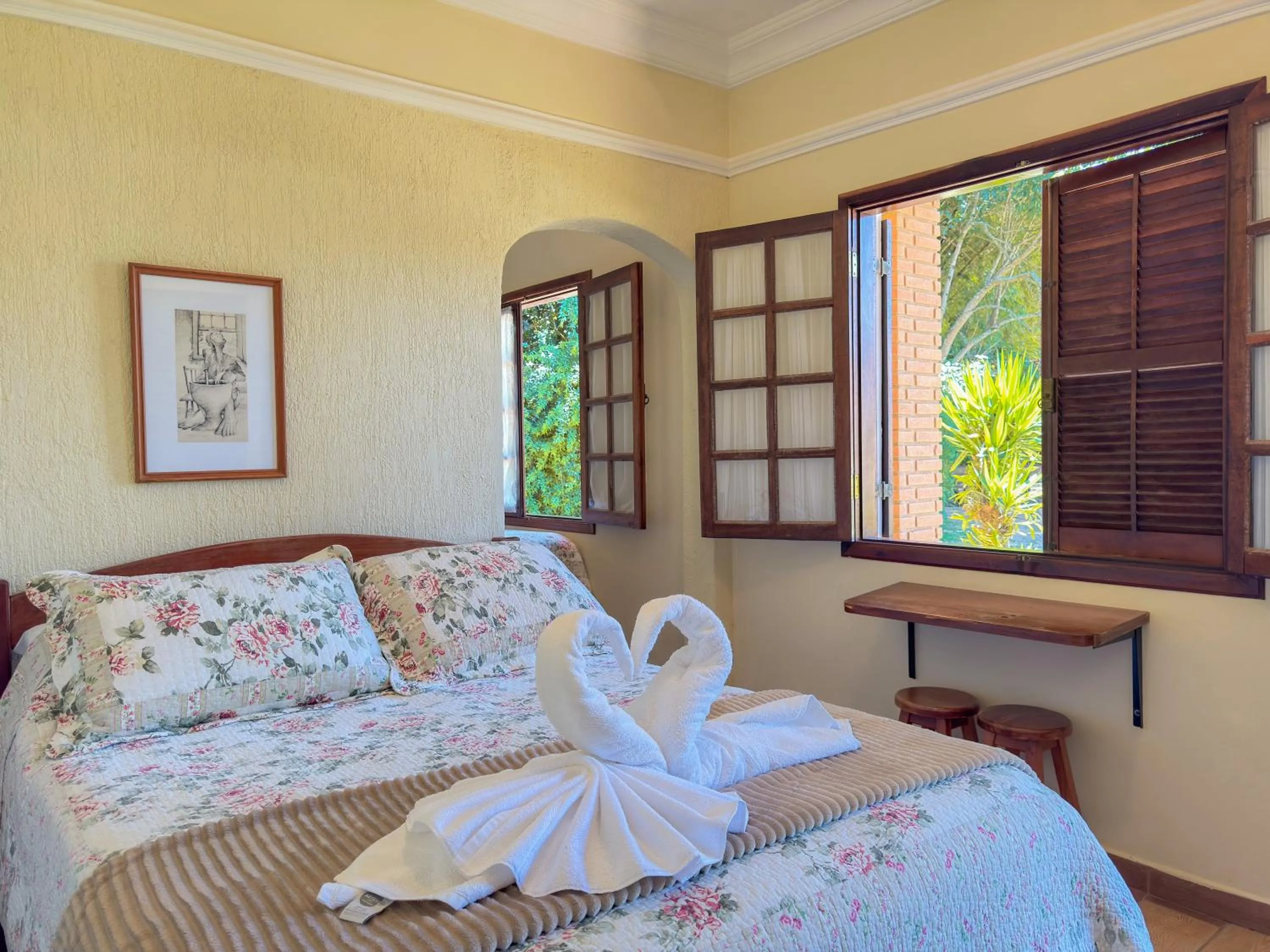 Bed in Pousada Flor de Ipe