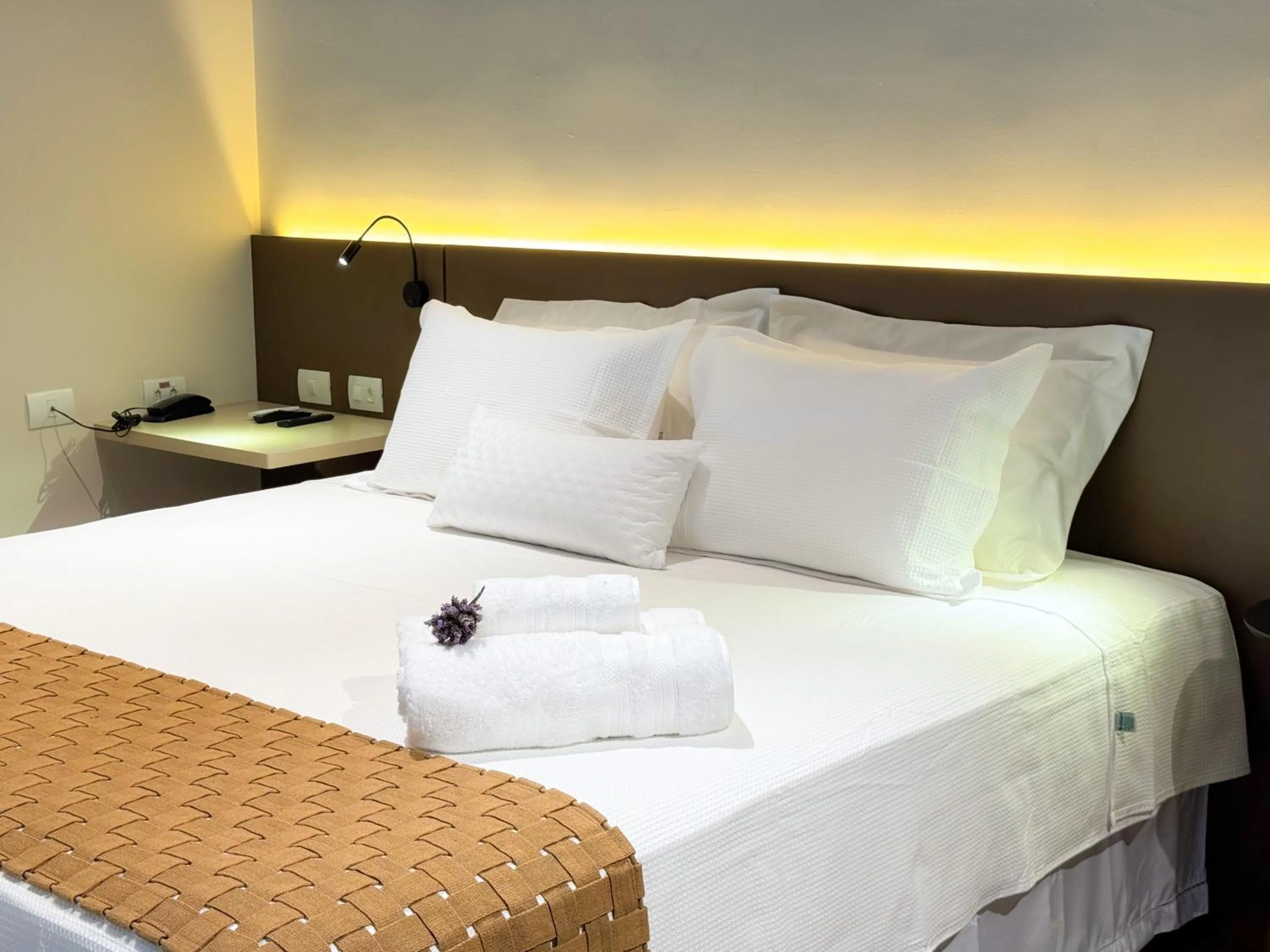 Bed in Pousada Flor de Ipe