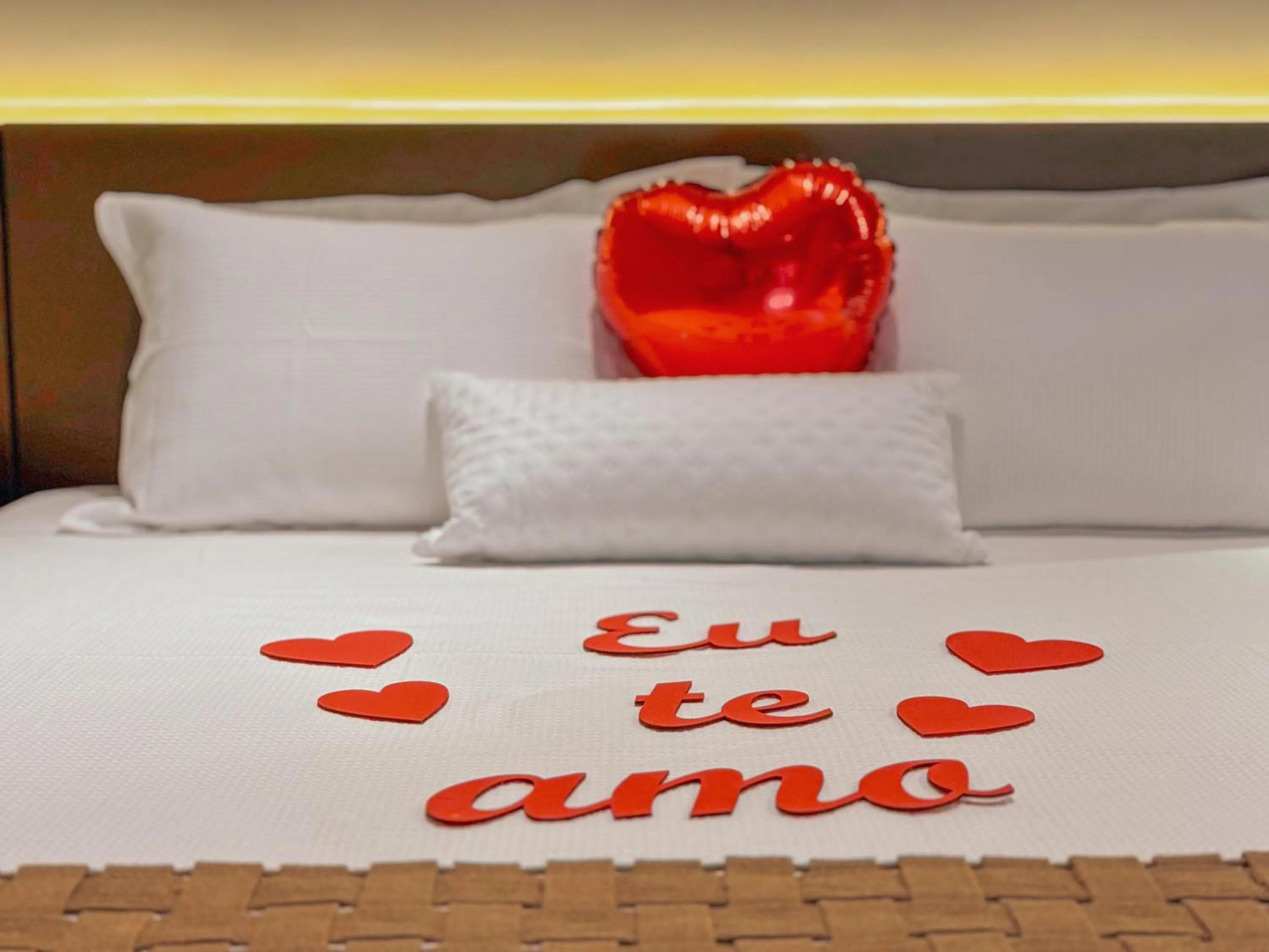 Bed in Pousada Flor de Ipe