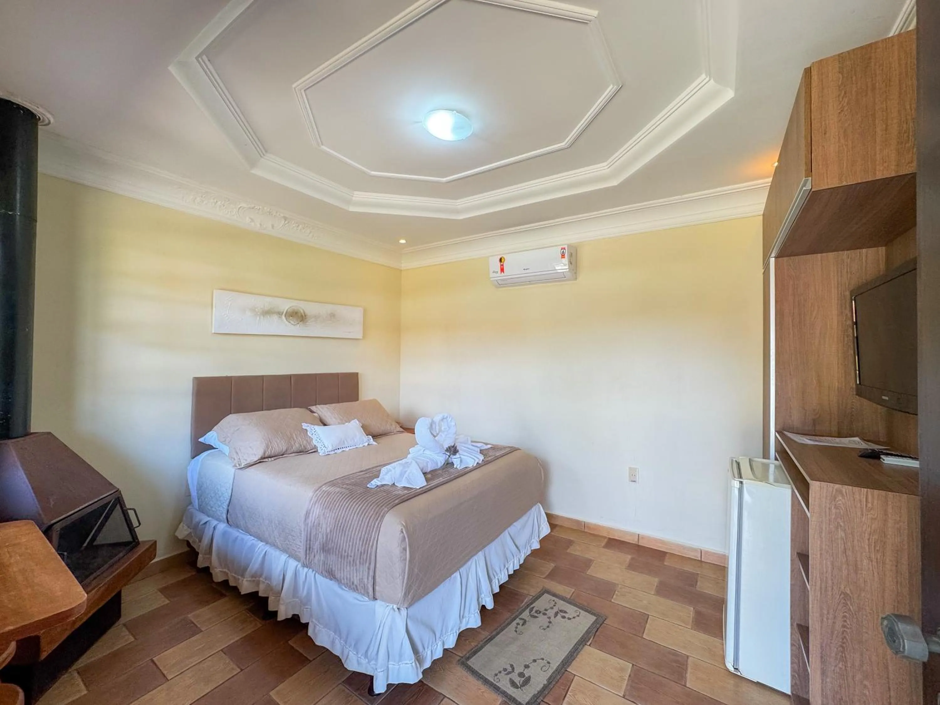 Bed in Pousada Flor de Ipe