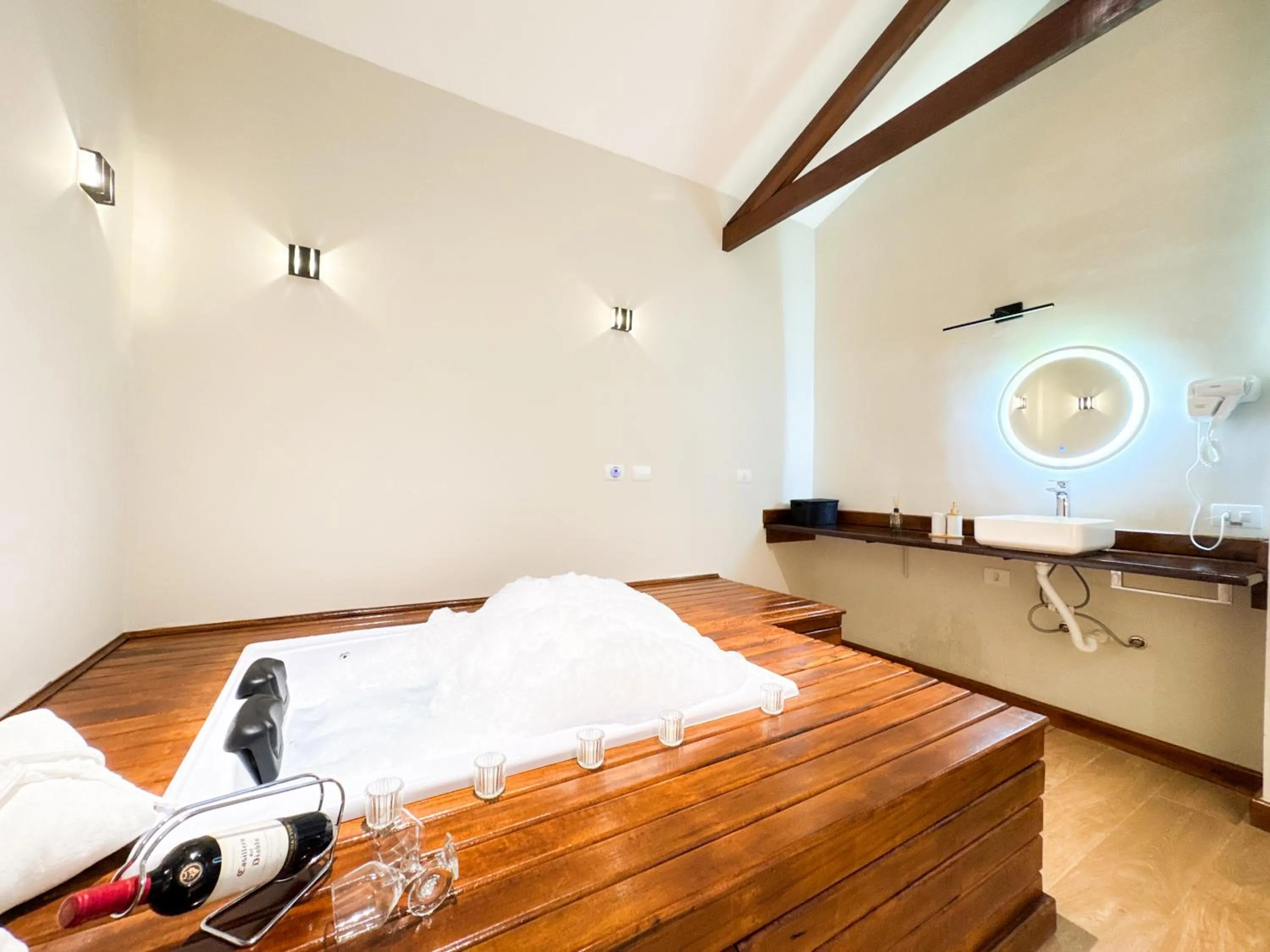 Bed in Pousada Flor de Ipe