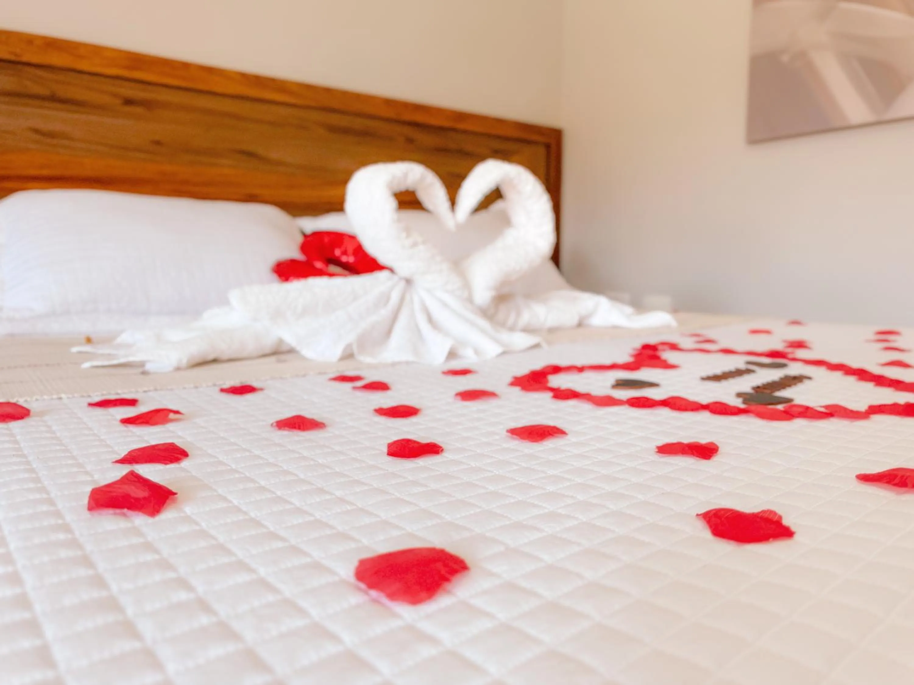Bed in Pousada Flor de Ipe