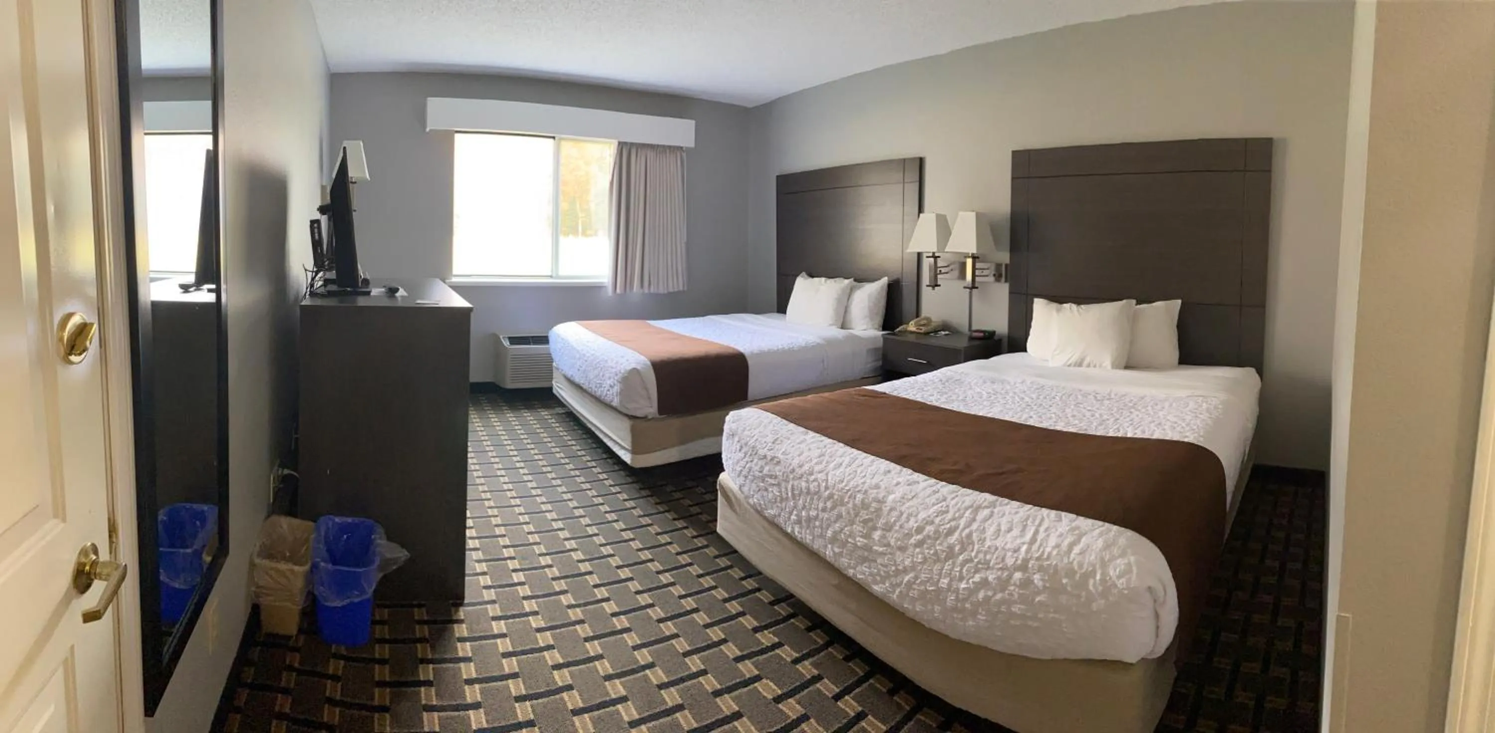 Bed in Adams Inn and Suites