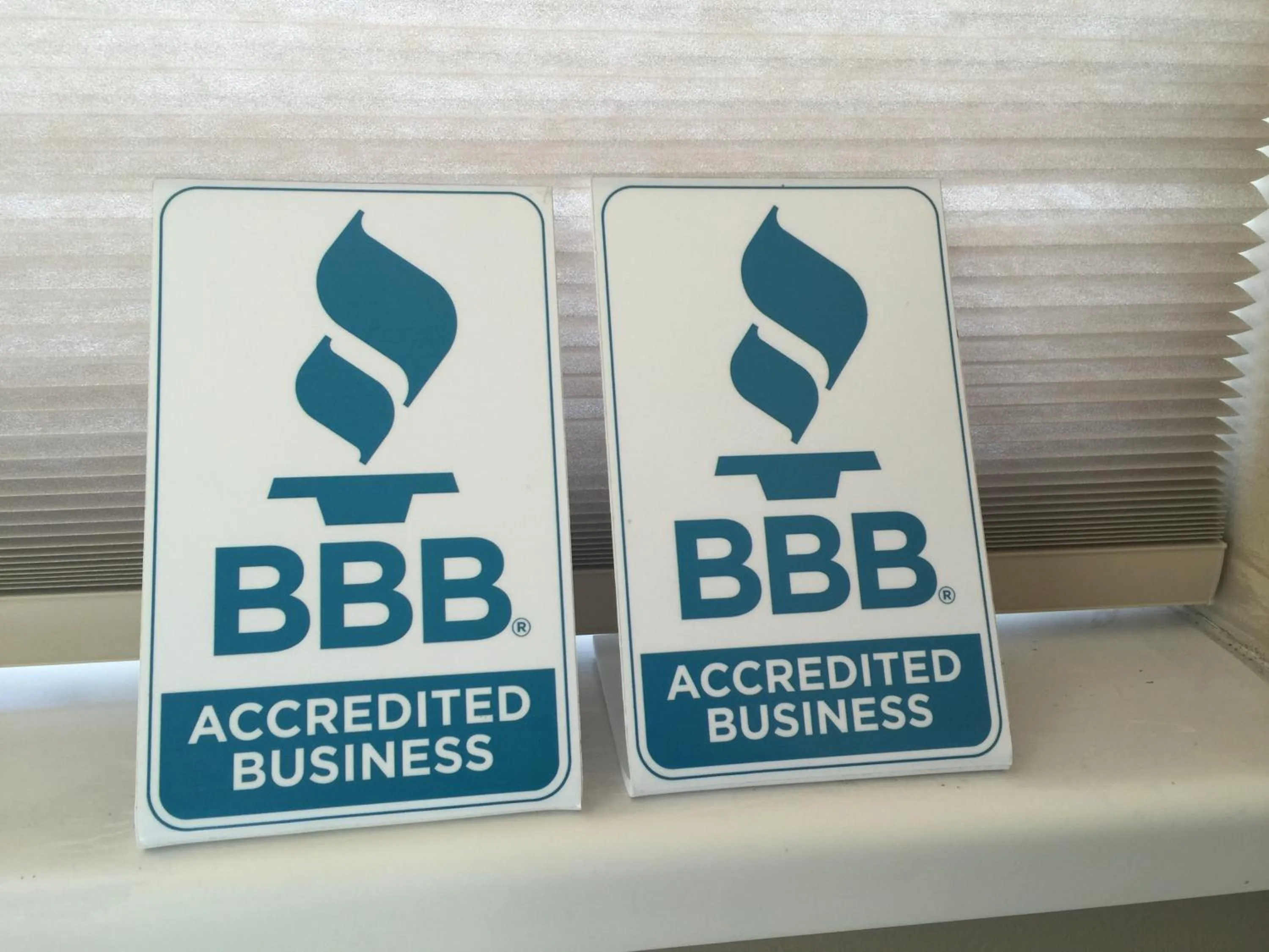 Logo/Certificate/Sign in Adams Inn and Suites