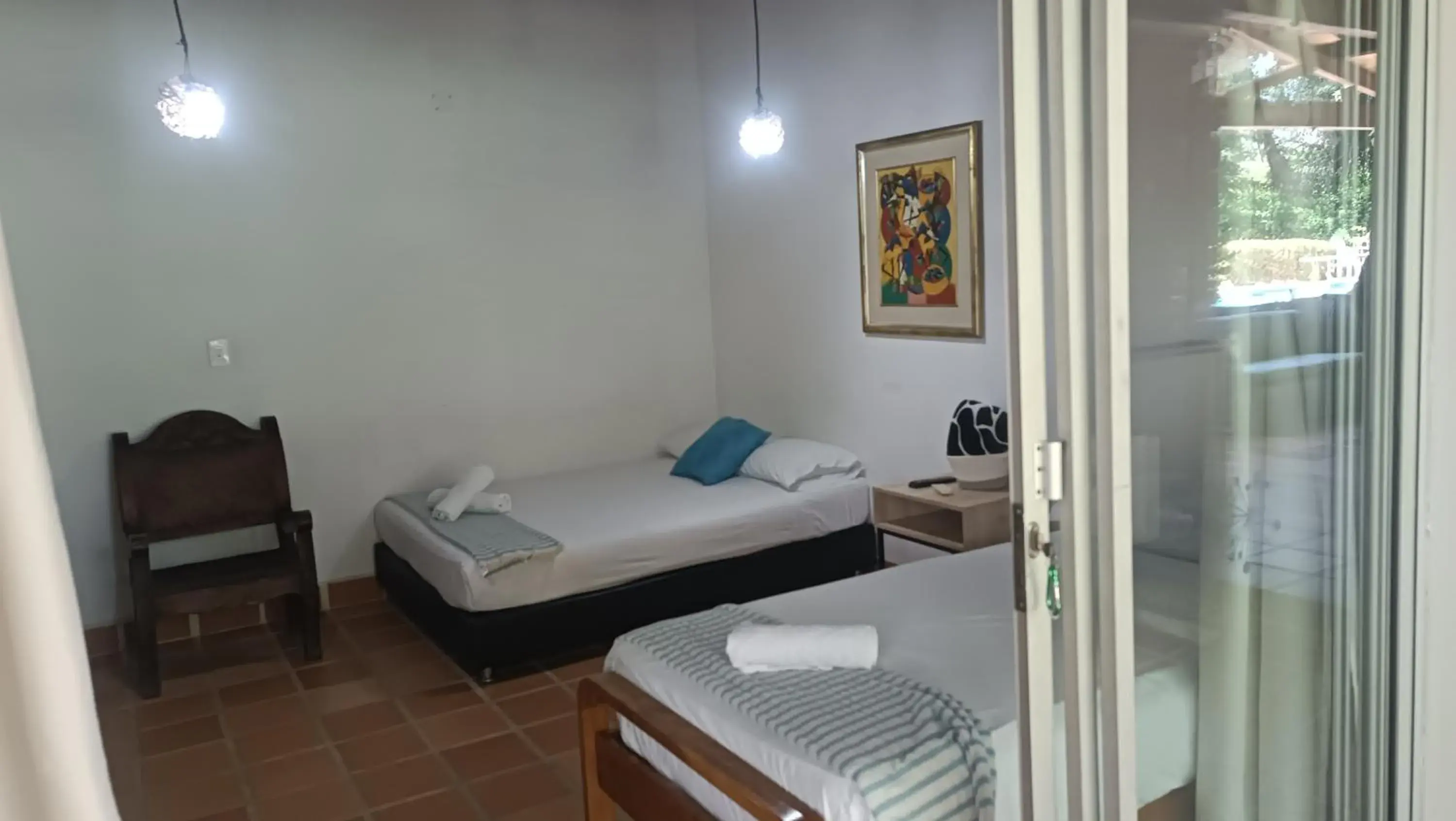 Triple Room in Finca Hotel La Estancia Santa Fe Triple Room in Finca Hotel La Estancia Santa Fe