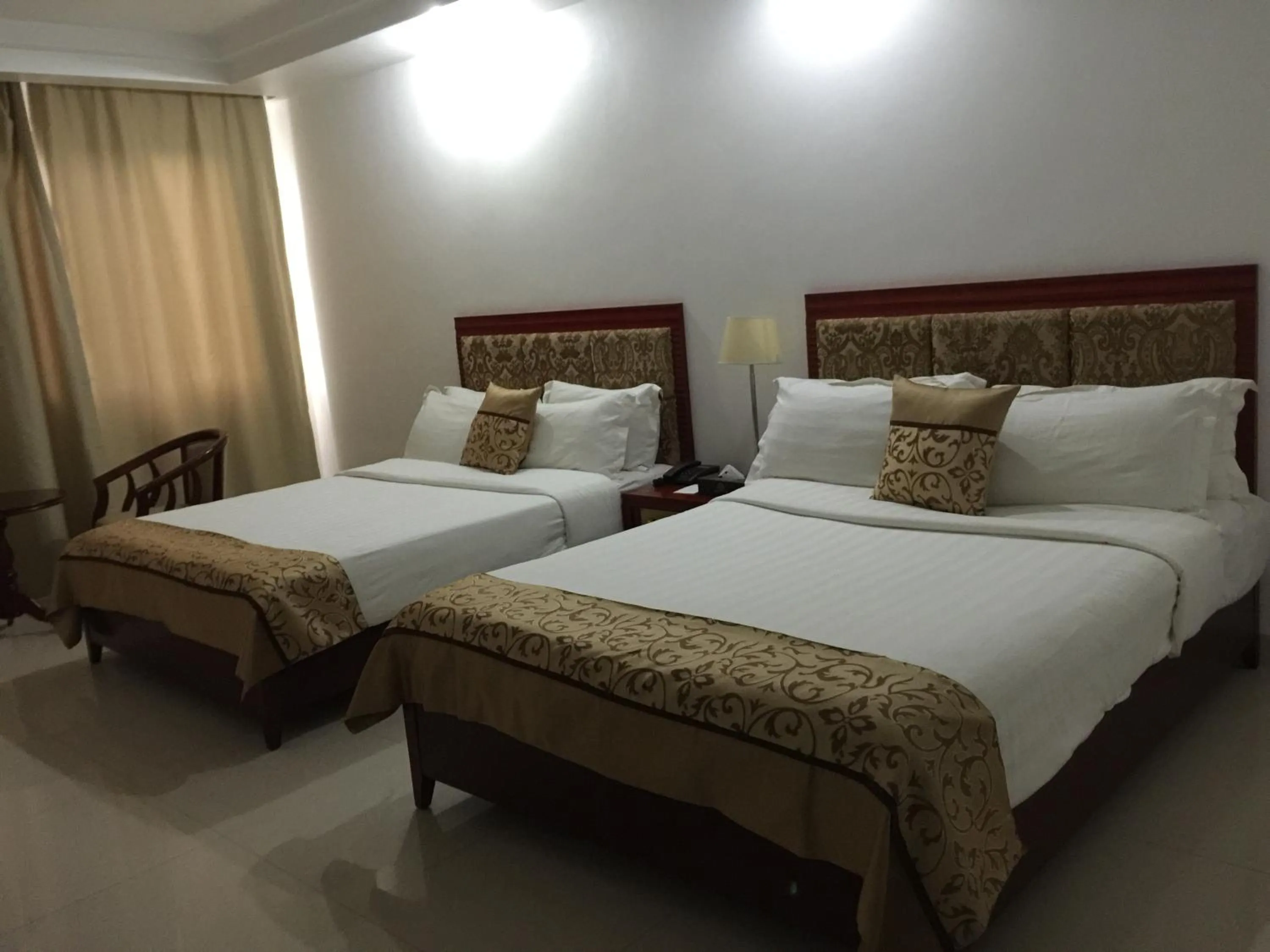 Bed in Emerald Hotel & Restaurant