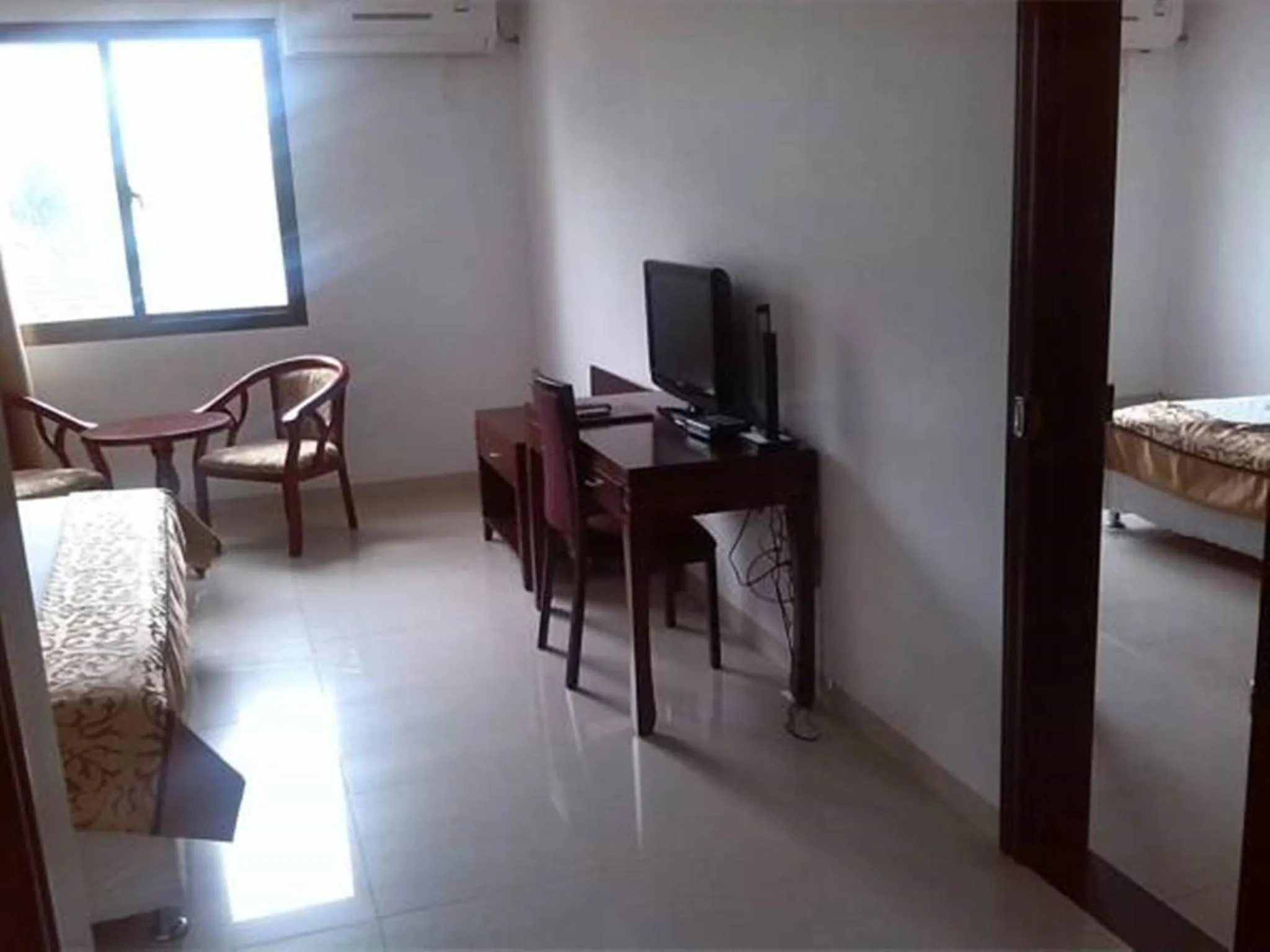 Bedroom in Emerald Hotel & Restaurant