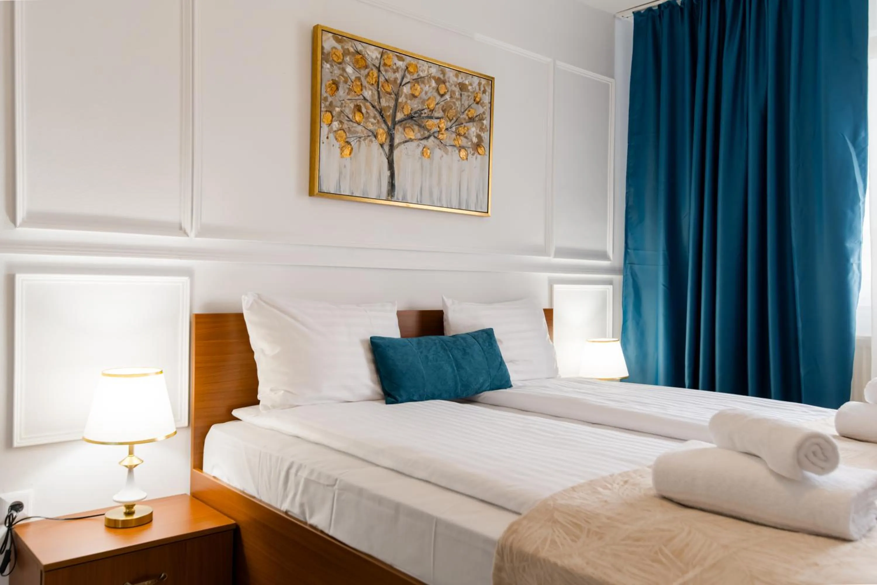 Bed in Hotel Royal Plaza By TimHotels