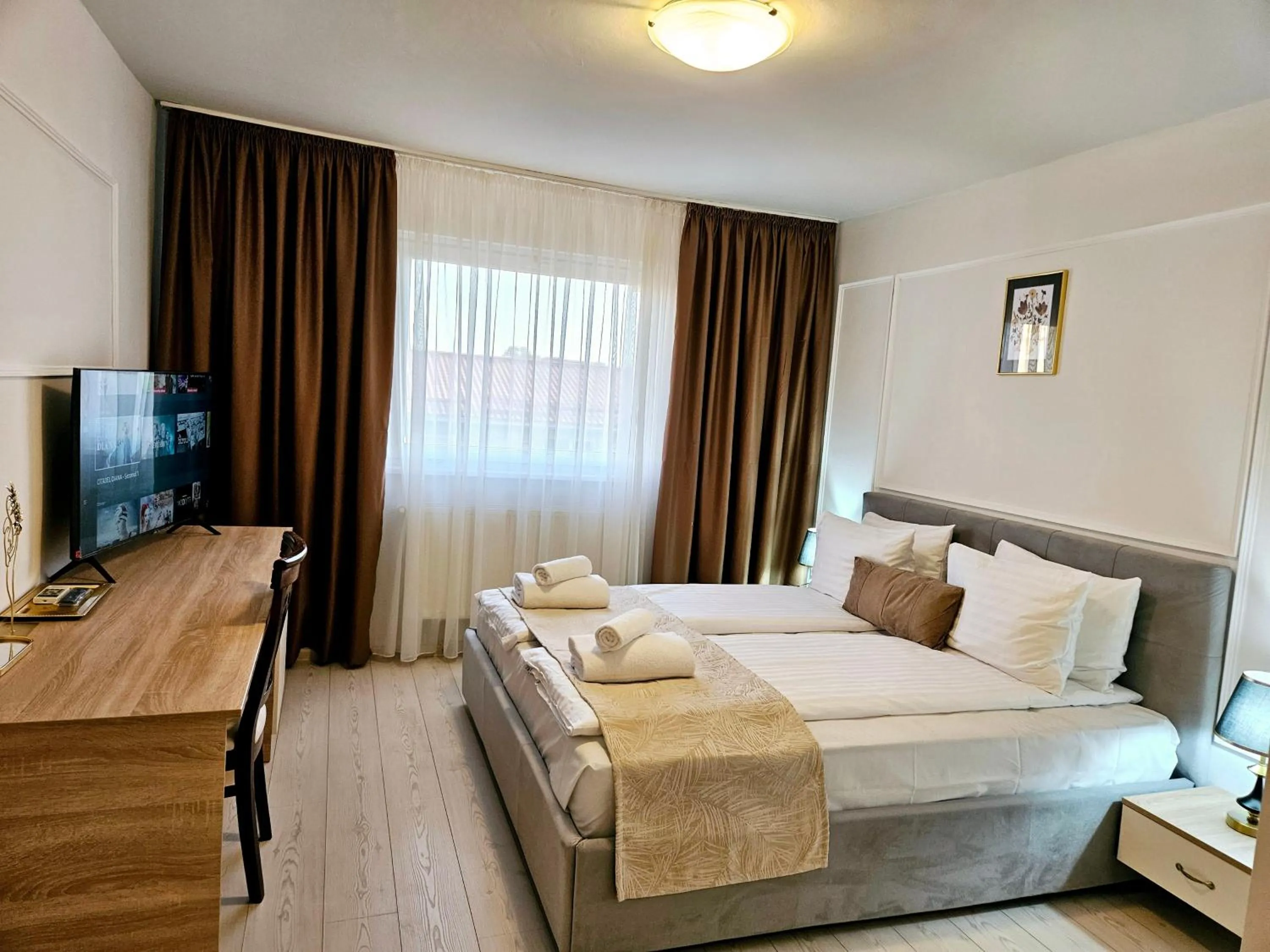 Bed in Hotel Royal Plaza By TimHotels