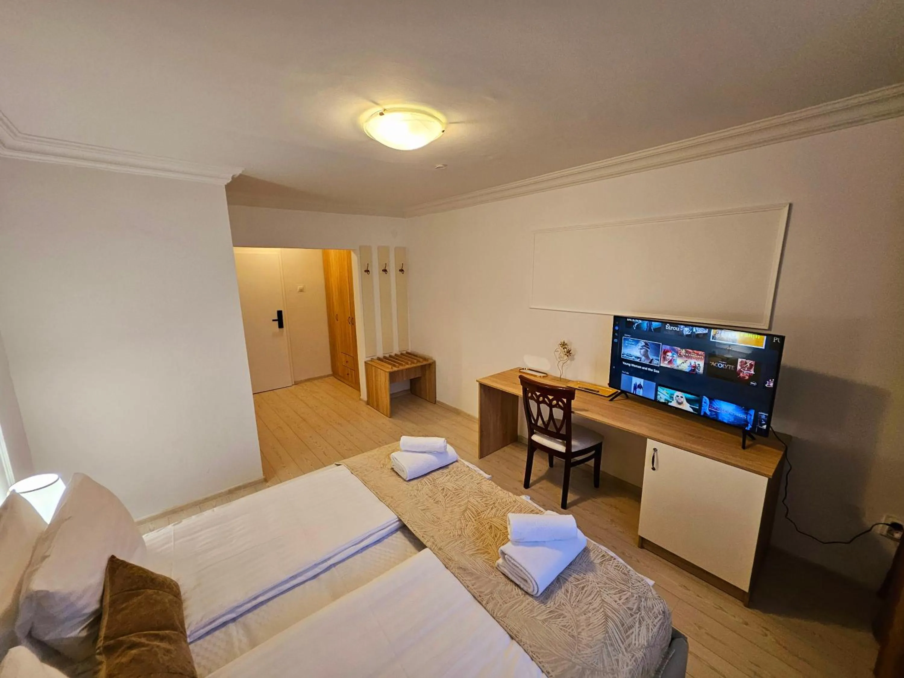 Bed in Hotel Royal Plaza By TimHotels