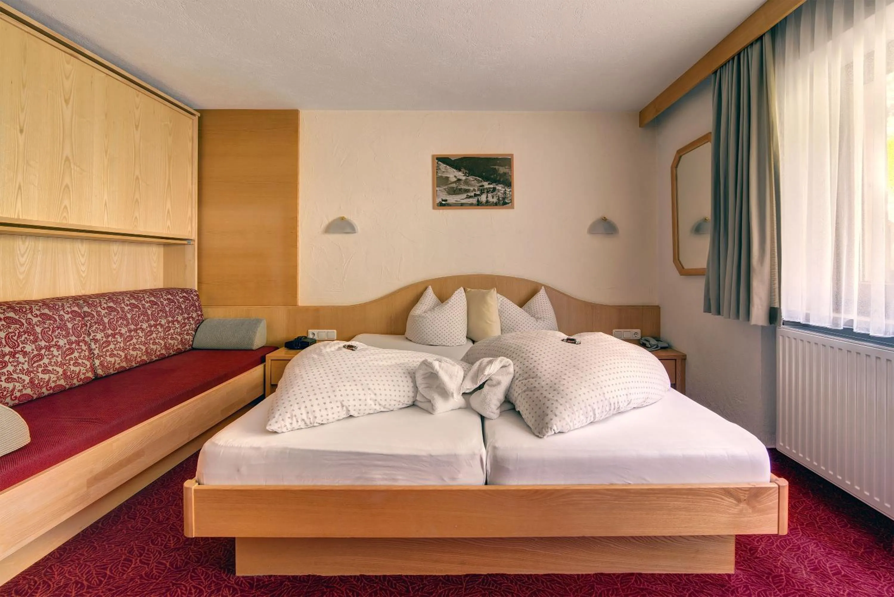 Photo of the whole room, Bed in Hotel Enzian Paznaun