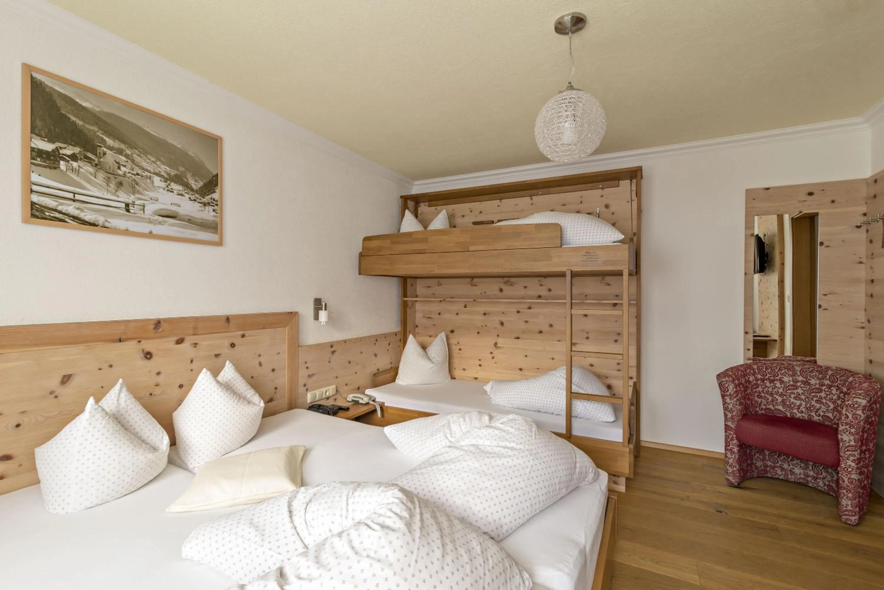 Photo of the whole room, Bed in Hotel Enzian Paznaun