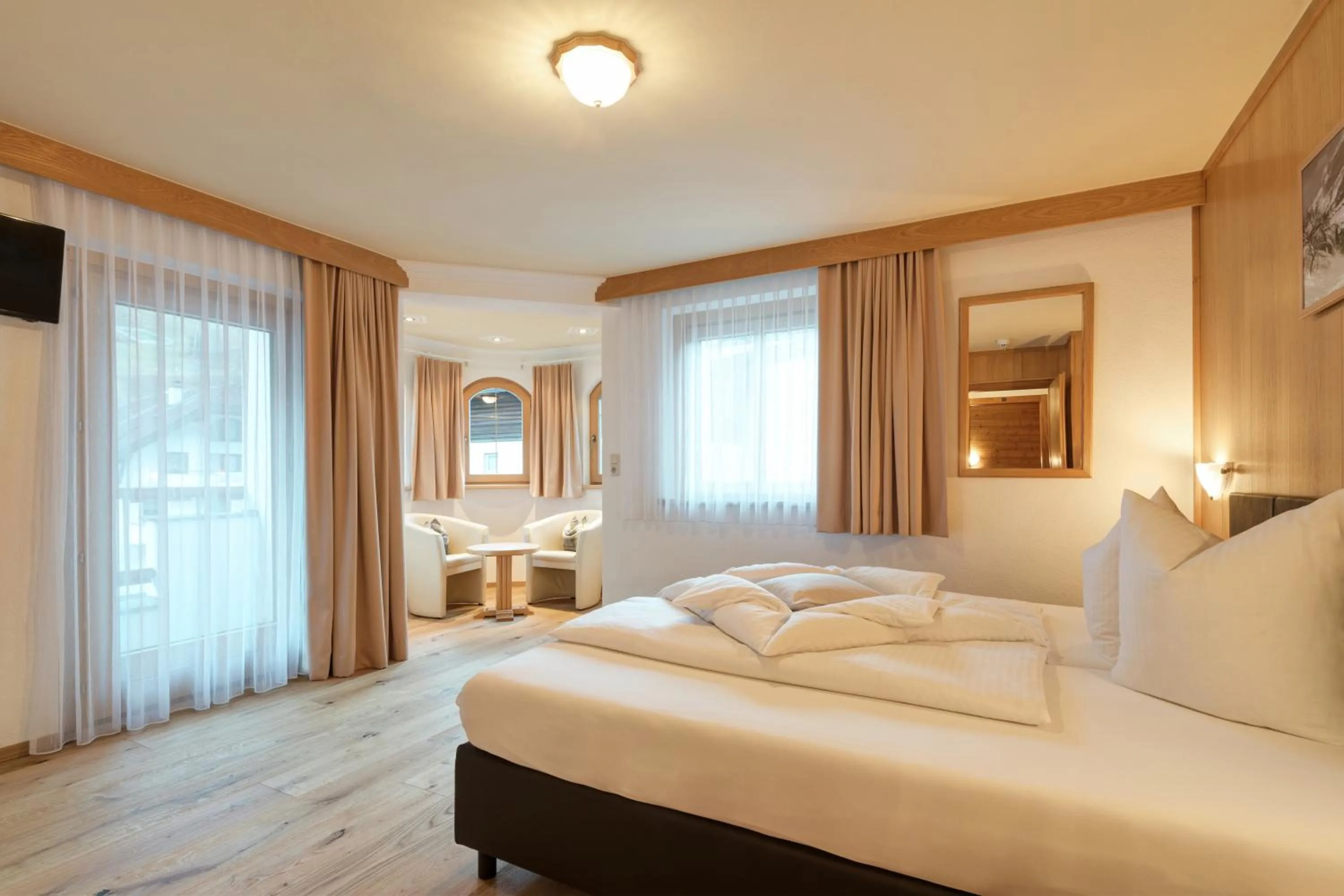 Bedroom, Bed in Hotel Enzian Paznaun