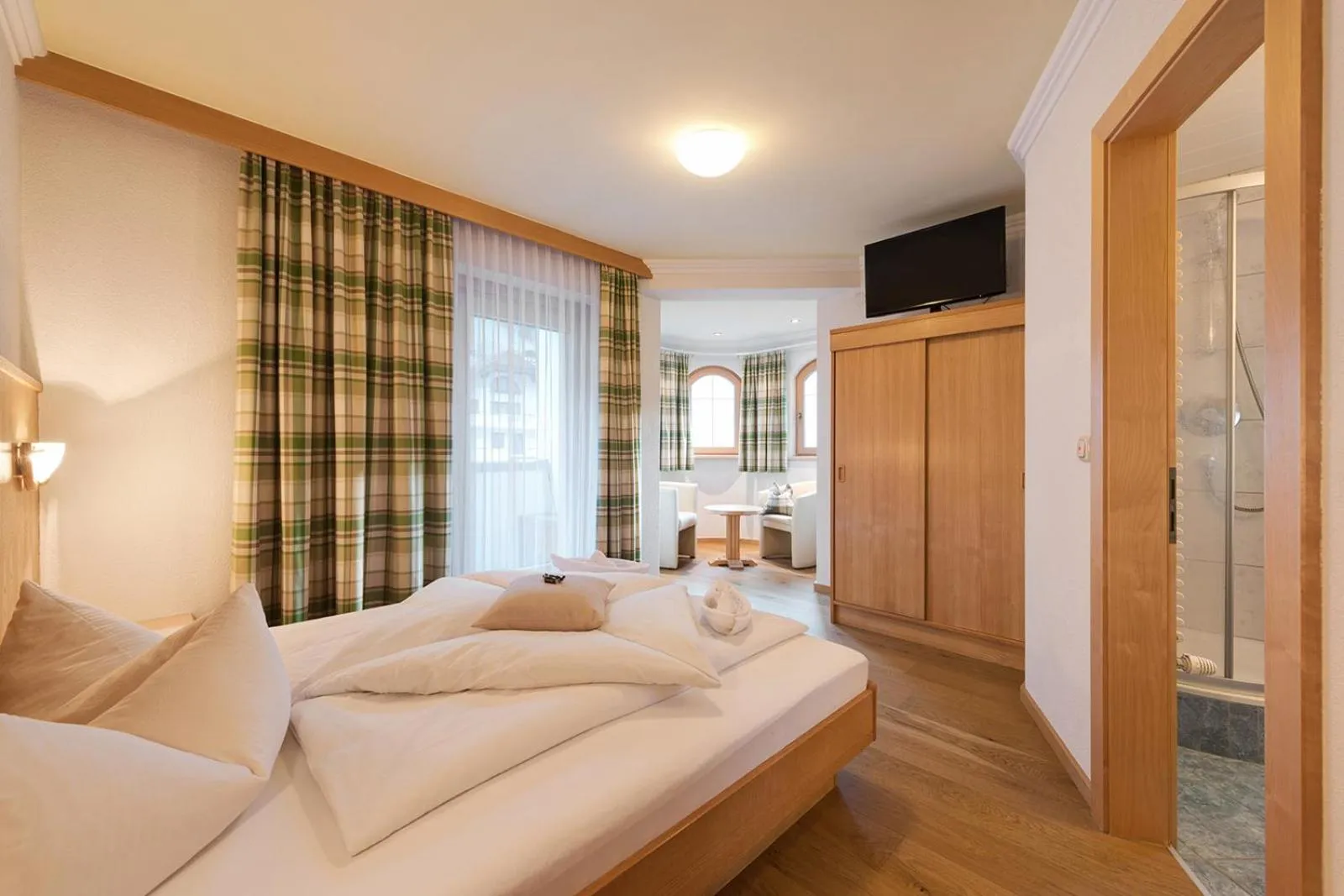 Photo of the whole room, Bed in Hotel Enzian Paznaun