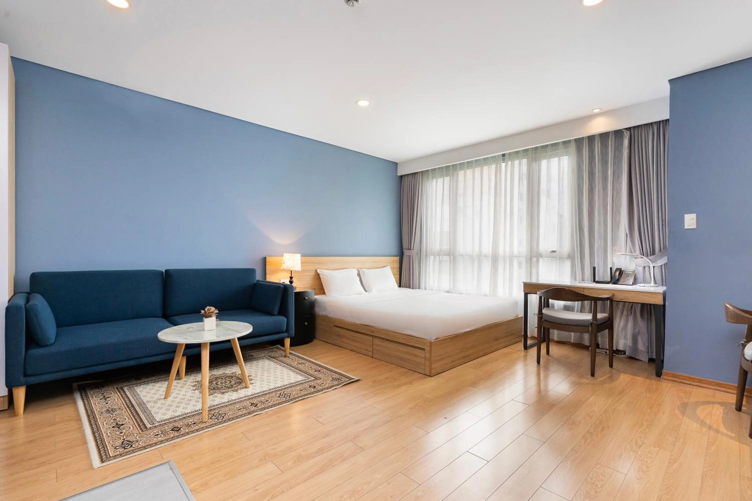 Photo of the whole room, Bed in Lancaster Ho Chi Minh Serviced Apartment Official