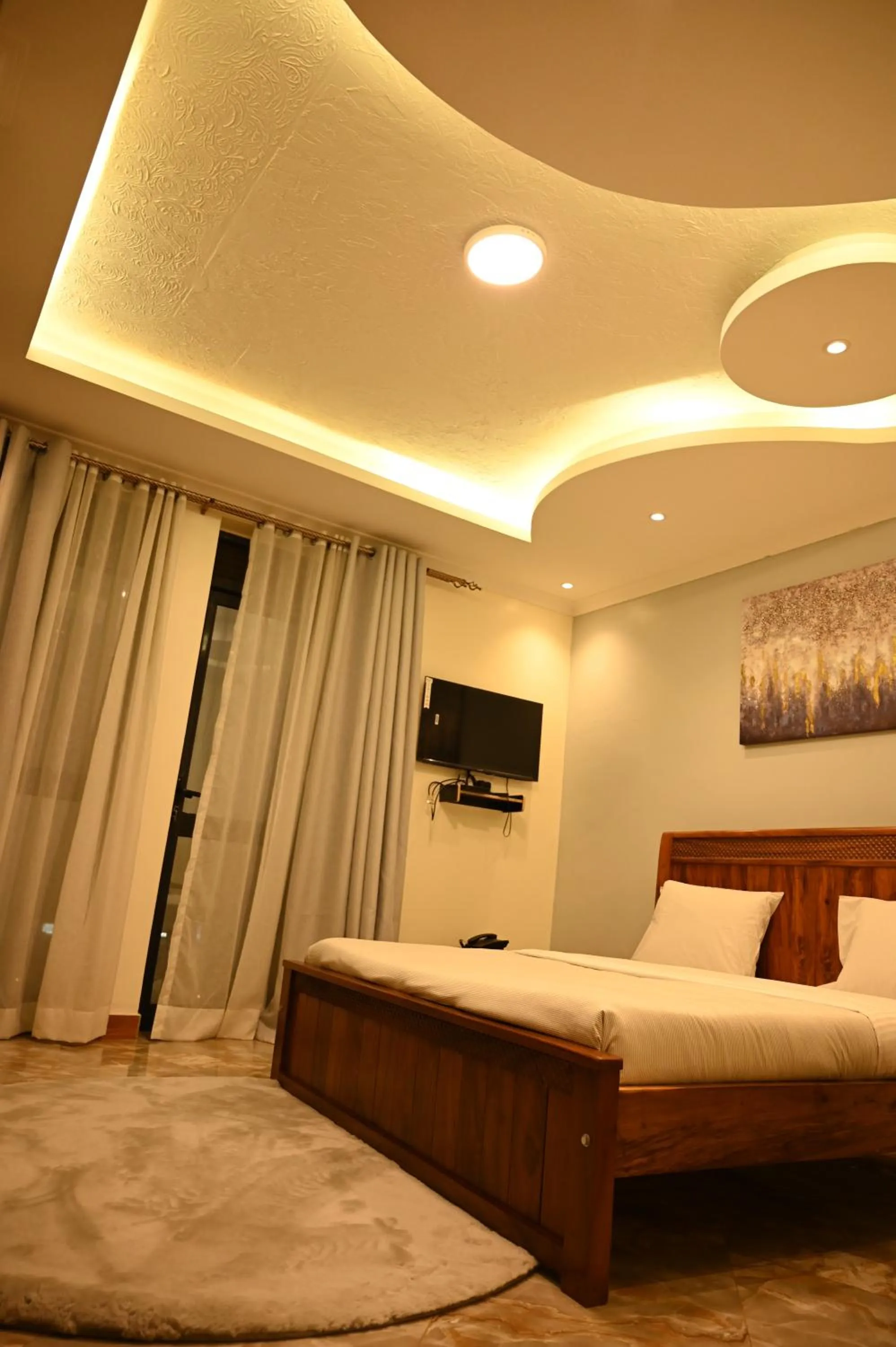 Bed in Neon Hotel Ntinda