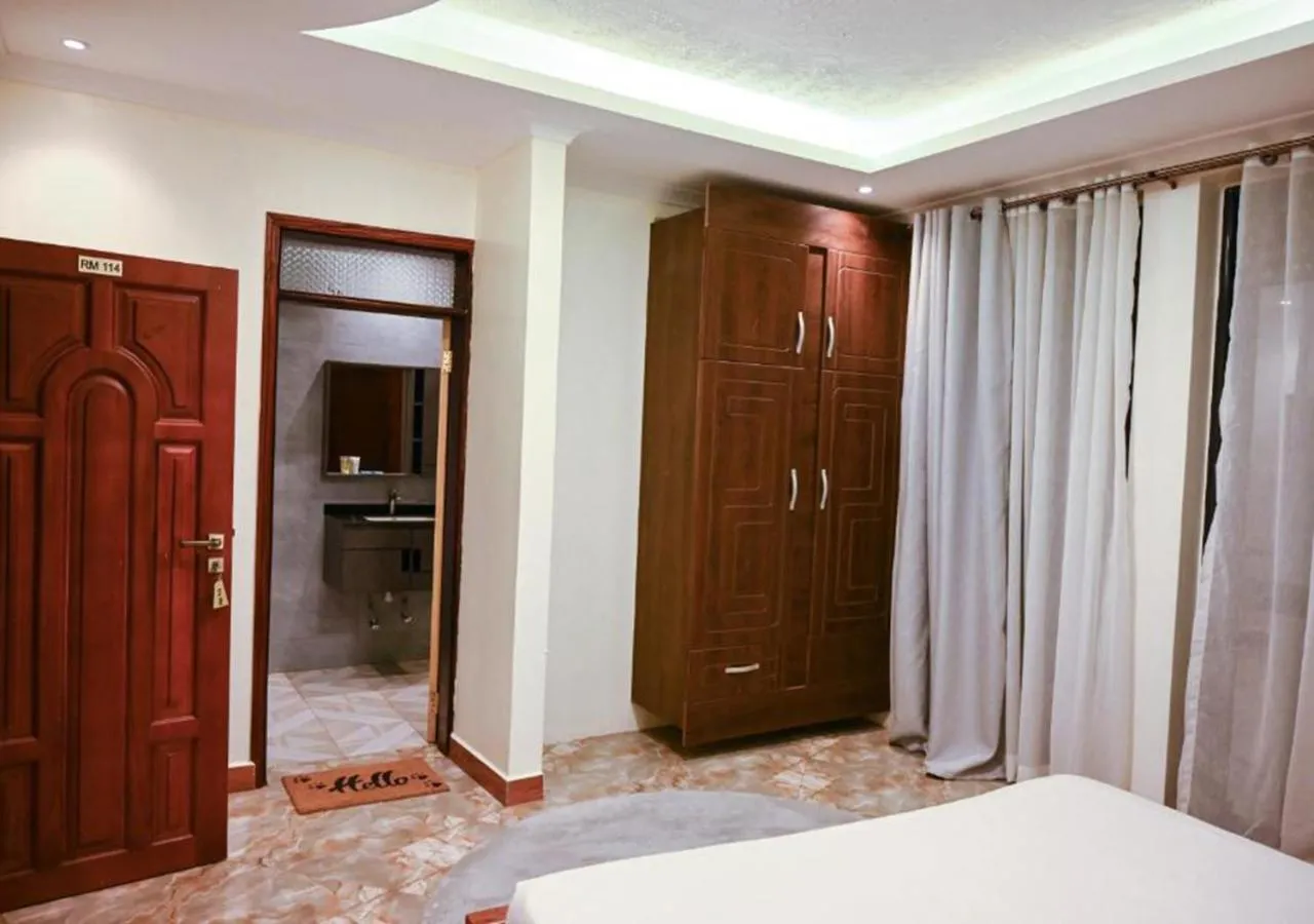 Bed in Neon Hotel Ntinda