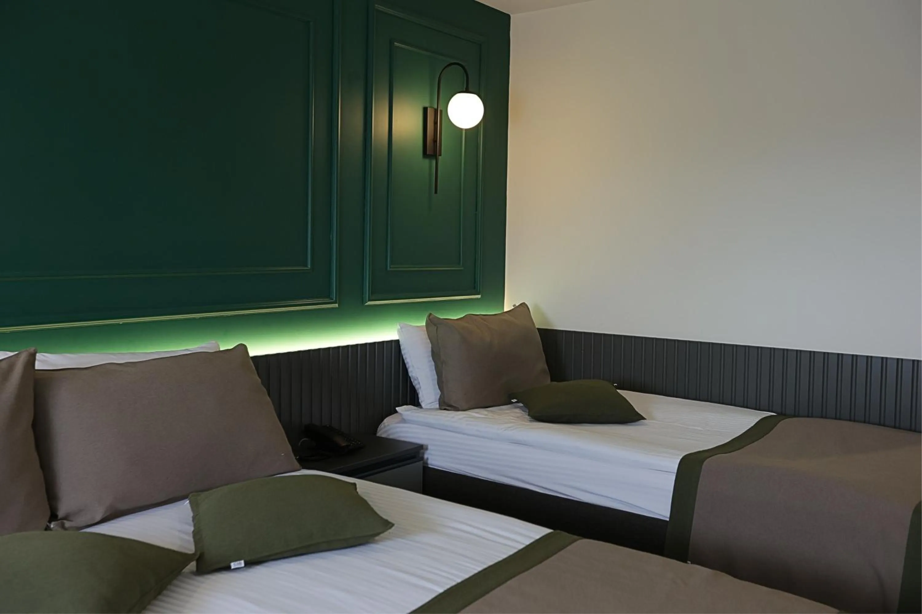 Bed in Ren Business Hotel