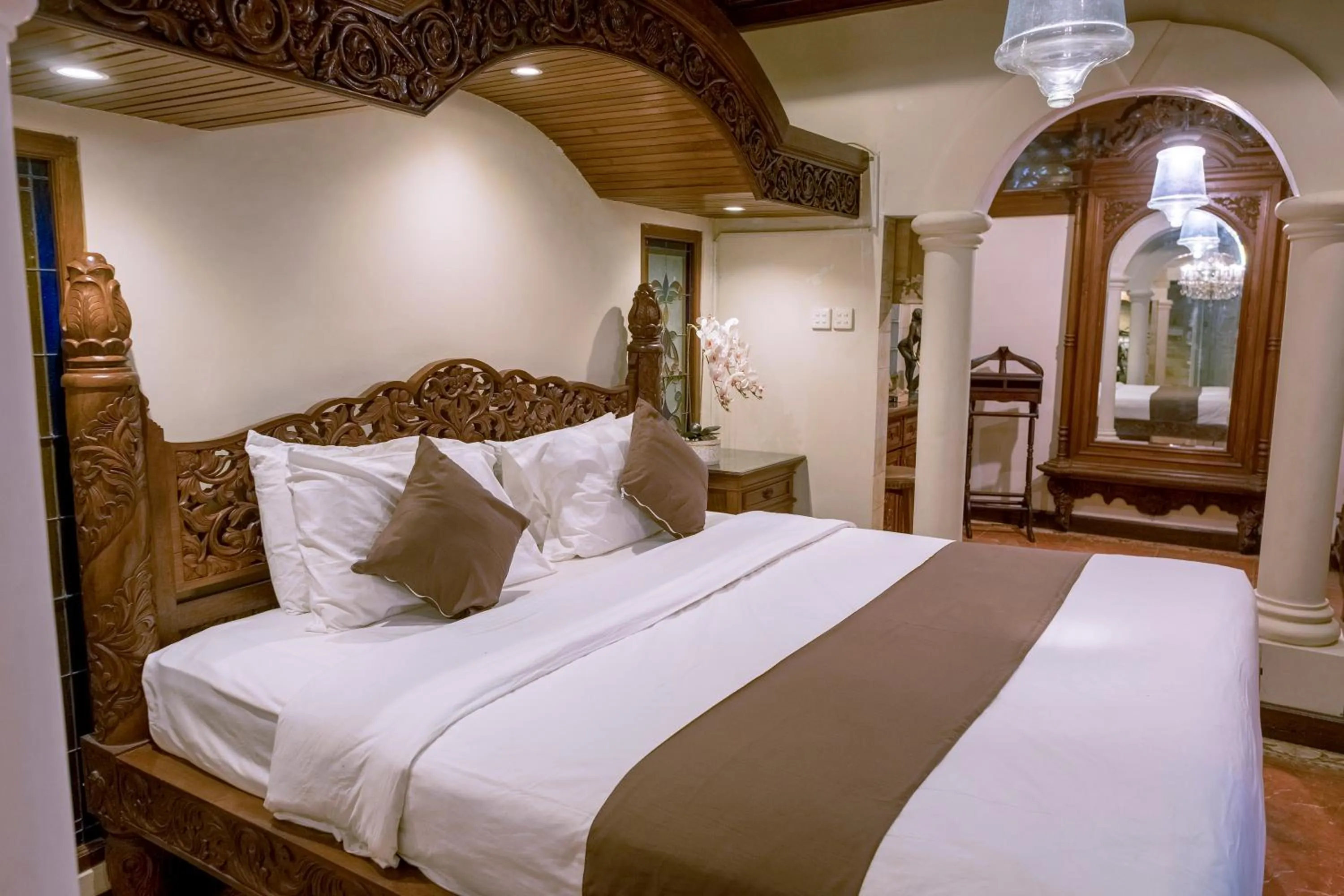 Bed in Rumah Pesik Art & Heritage Hotel
