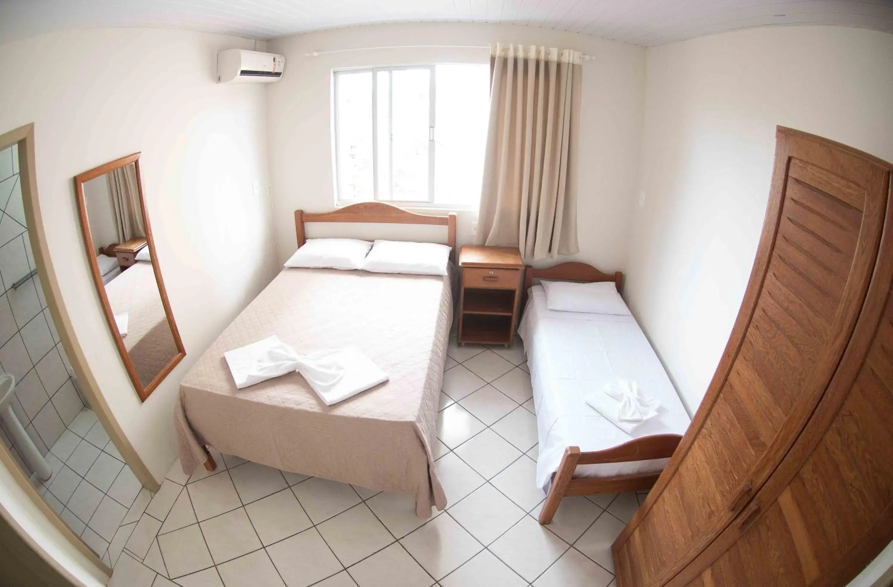 Standard Triple Room in Pousada Dom Toazza Standard Triple Room in Pousada Dom Toazza