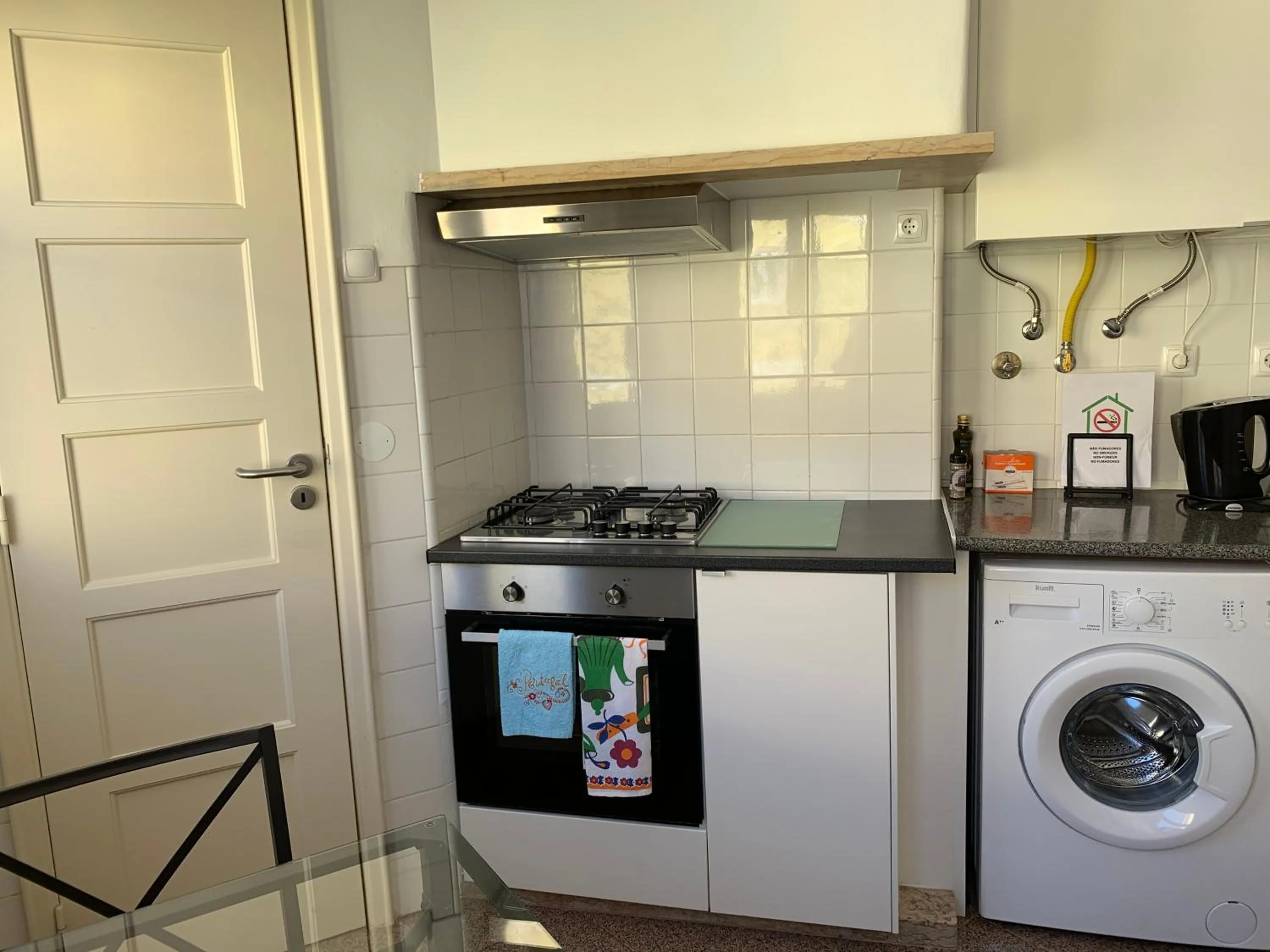 Kitchen or kitchenette in Discovery Apartment Expo - Aeroporto