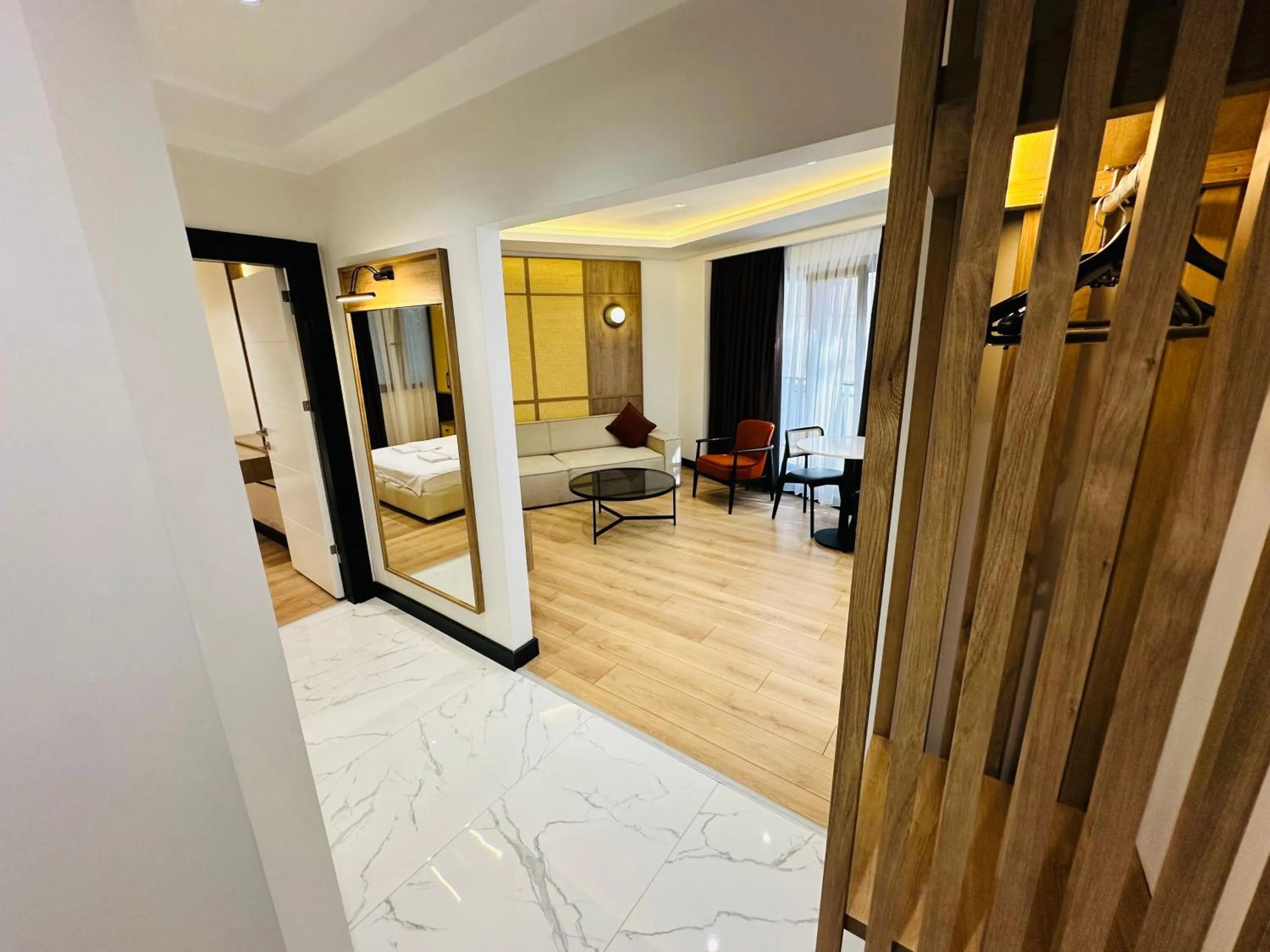 Living room, Bed in Rose Point Residence