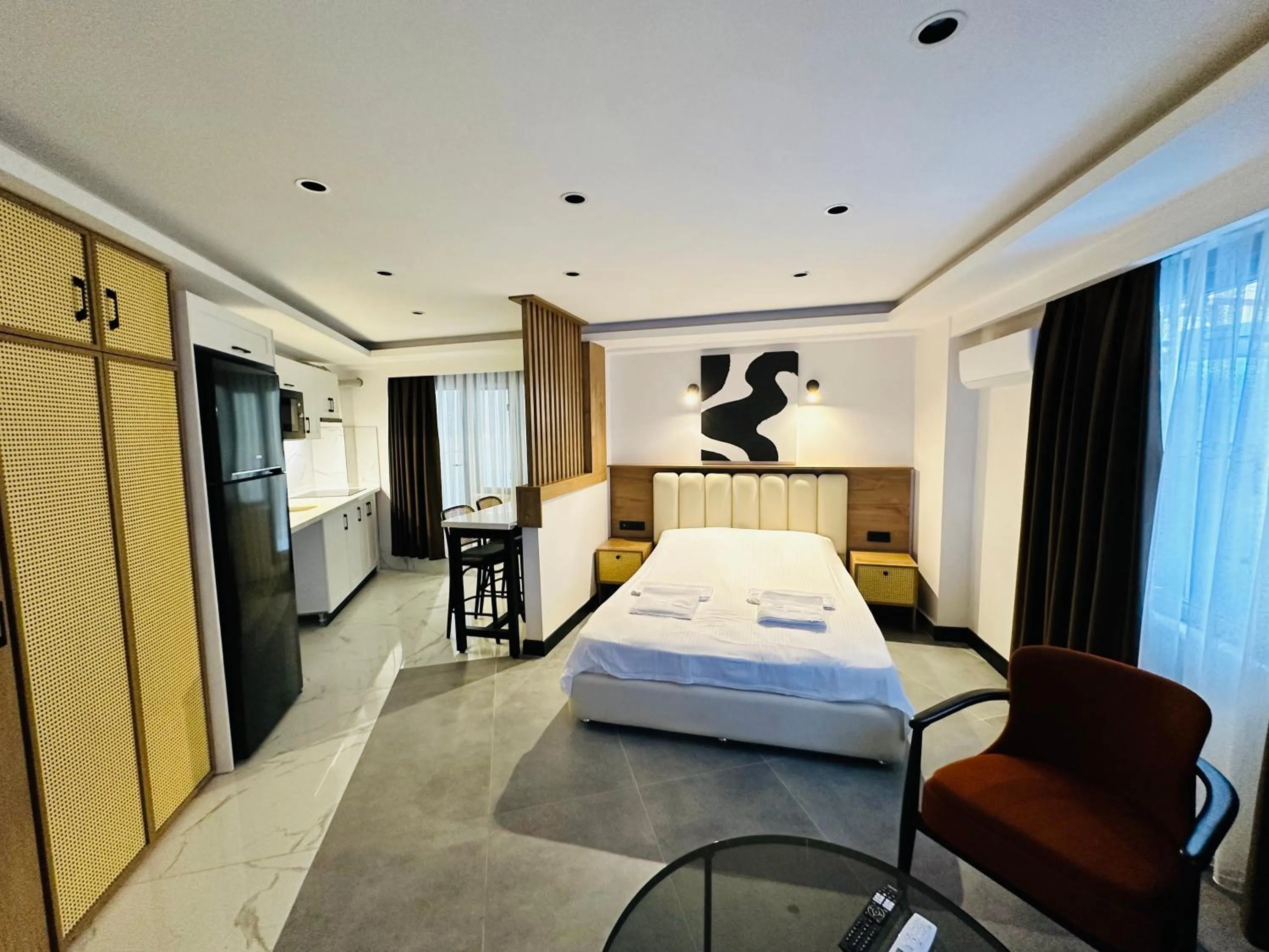 Communal lounge/ TV room, Bed in Rose Point Residence