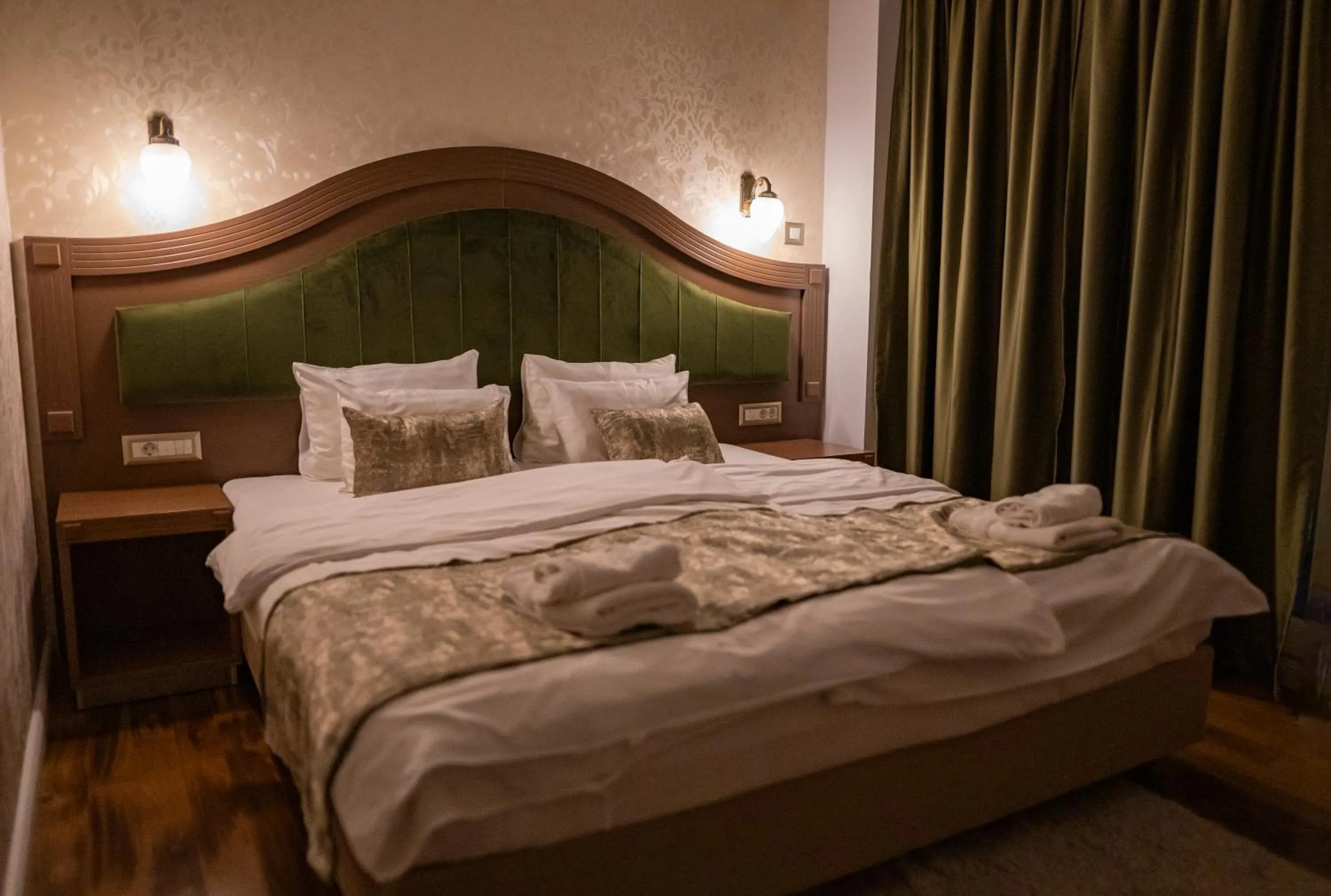 Bed in City Palace Hotel