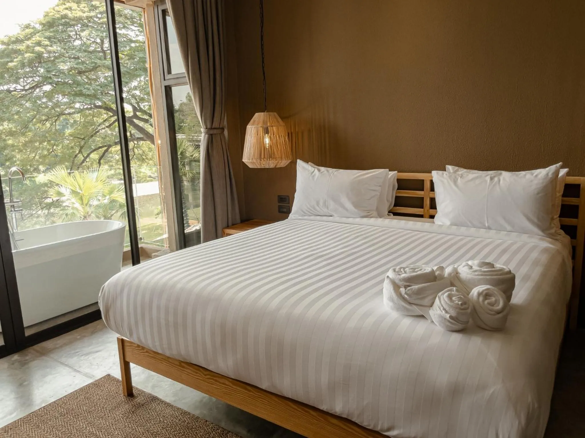 Bed in Historykan Kanchanaburi Hotel