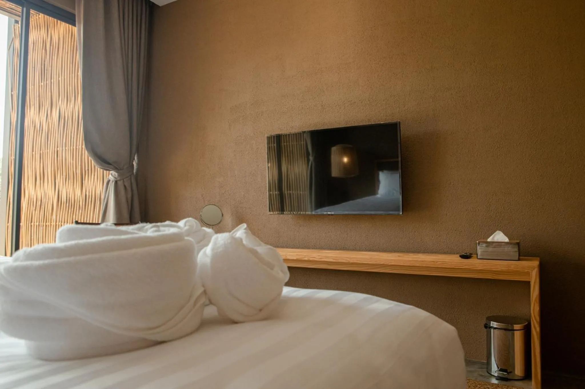 Bed in Historykan Kanchanaburi Hotel