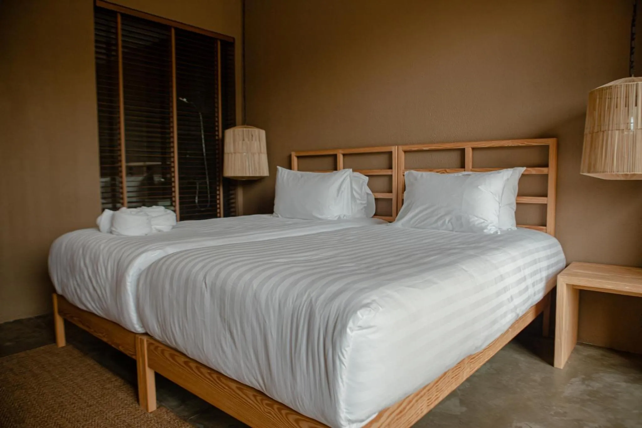 Bed in Historykan Kanchanaburi Hotel