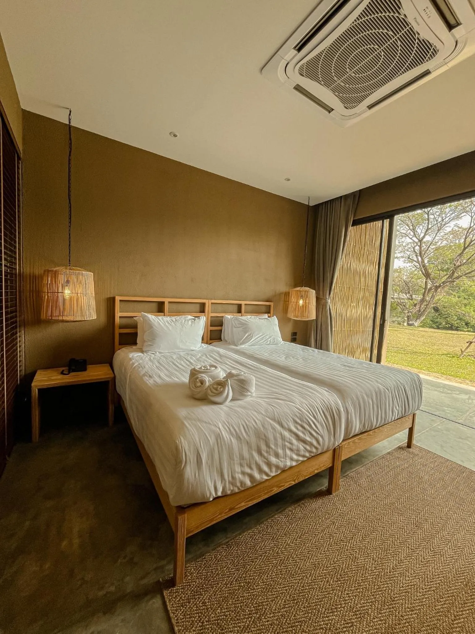 Bed in Historykan Kanchanaburi Hotel